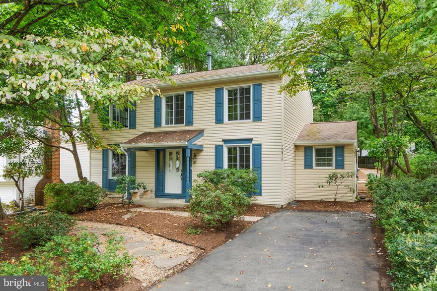 Welcome to your dream home in the sought-after community of University Square! This 
beautifully updated 3 bedroom, 2.5 bath colonial combines classic charm with modern upgrades 
and is truly move-in ready. This property is a true arborist’s dream. Wander along the paths and under the arbors, alongside the babbling waterfall, and amongst the abundant trees and foliage. A little slice of paradise. Step inside to a bright, flowing floor plan where a freshly painted interior and gleaming 
hardwood floors throughout set the stage for elegant living. The inviting foyer opens to a formal living room with a cozy wood-burning fireplace and a formal dining room—perfect for both entertaining and everyday gatherings. At the heart of the home is the gorgeous, fully remodeled kitchen featuring stylish white cabinetry, granite countertops, a mobile island, ceramic tile backsplash, recessed lighting, and brand-new stainless steel refrigerator. From the kitchen and living room, step down into the expansive sunroom, where vaulted ceilings and oversized picture windows bring the outdoors in. Sunroom french doors lead to a serene screened-in porch overlooking mature trees and vibrant perennial gardens. In the spring, this outdoor retreat transforms into a gardener’s paradise, with fresh blooms and vibrant colors appearing week after week. This includes hosta, milkweed (for Monarch butterflies), trout lilies, day lilies, ferns, tulips, daffodils, crocus, snowdrops, sundrops, Canada anemones, and hops.  Two rain barrels help nurture the ever-changing seasonal blooms.  Gutter guards keep maintenance down.  Upstairs, the spacious primary suite offers mirrored closets and a remodeled ensuite bath. Two additional primary-sized bedrooms and an updated full bath complete the upper level. Additional highlights include a freshly repainted exterior,  private driveway, and ample street parking for guests. The location is unbeatable—just 5 miles to Vienna Metro, minutes to Routes 236, 50, I-66, and I-495. Enjoy being walking distance to the elementary school, Fairfax City, and George Mason University. Shopping, dining, and entertainment are just minutes away at Fair Oaks Mall and Fairfax Corner. Experience the perfect blend of convenience, comfort, and natural beauty with this exceptional property! Welcome home!