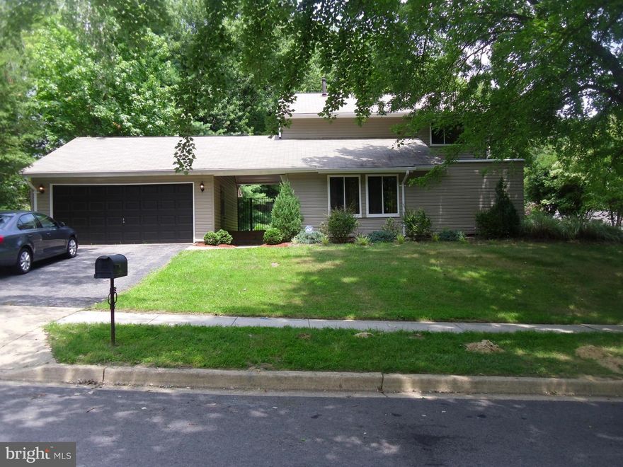 Move in ready. Remodled kitchen w/corian countertops and deep sink, updated bathrooms, new exterior siding and windows.  Wood floors throughout main lvl and ceramic tile in kitchen and bathrooms.  Nice size brs w/large Mstr. Br. Great outdoor space with patio off living room and kitchen and basketball court in backyard w/shed.  Enough lvl yard space for entertaining and fully fenced.