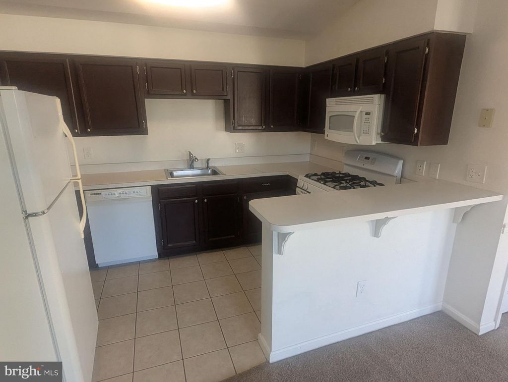 Photo of 11010 Koman Circle #301, MANASSAS, VA 20109 (MLS # VAPW2105518)