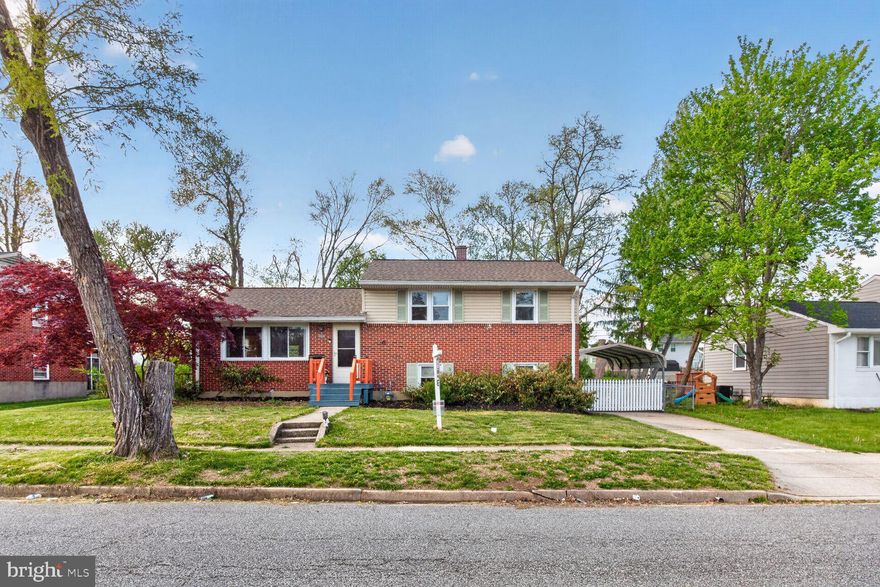 Welcome to 8506 Church Lane! This split level home features 3 bedrooms, 1 full bath, one-half bath, and a 1-car carport.   On the main level you will find a large living room and dining room area with gleaming hardwood floors and large windows.  The upper level features 3 bedrooms with hardwood floors and a renovated full bathroom.   The lower level includes a large family room and half bathroom.  Home updates include roof, windows, siding, refinished hardwood floors on main level, kitchen countertops, new cooktop, and fresh paint throughout home.  1-Year Home warranty.