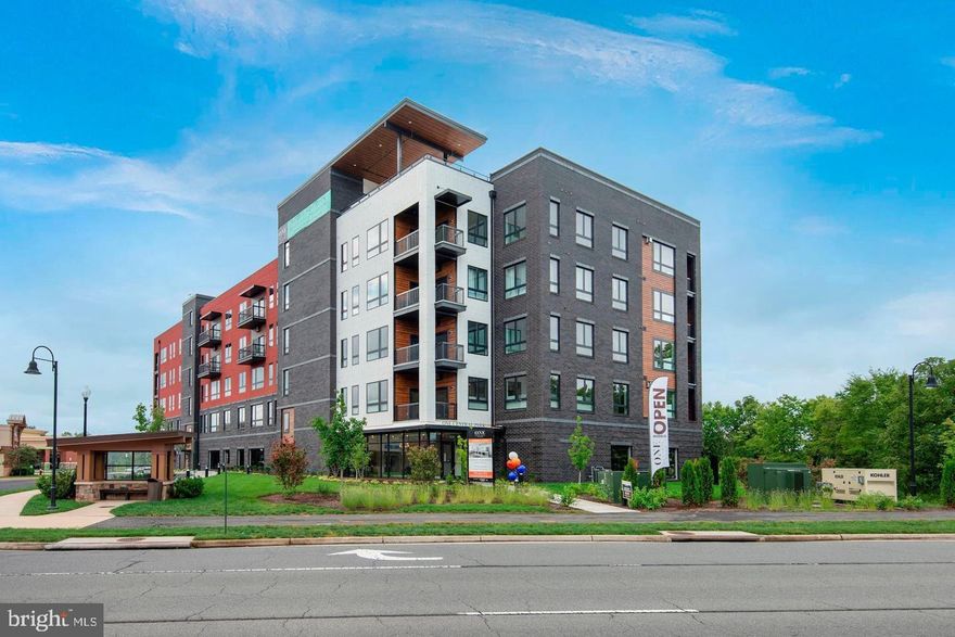 Welcome home to One Loudoun!  This stunning 3 Bedroom/2.5 Bath Luxury condominium was built in 2021. Boasting 1787 square feet of indoor living space, this home has 10 foot ceilings, quartz counters, SS Jenn-Air appliances, wide plank wood floors,  ample closet space, and full sized washer & dryer in separate laundry room.  Amenities include a roof top terrace with a fireplace & grill.  One parking spot included in the covered garage.  Pets welcome with deposit. Located walking distance from the shops & restaurants at One Loudoun, Trader Joe’s, iFLY indoor skydiving, and the Top Golf driving range.  Easy access to bus routes and commuting corridors.