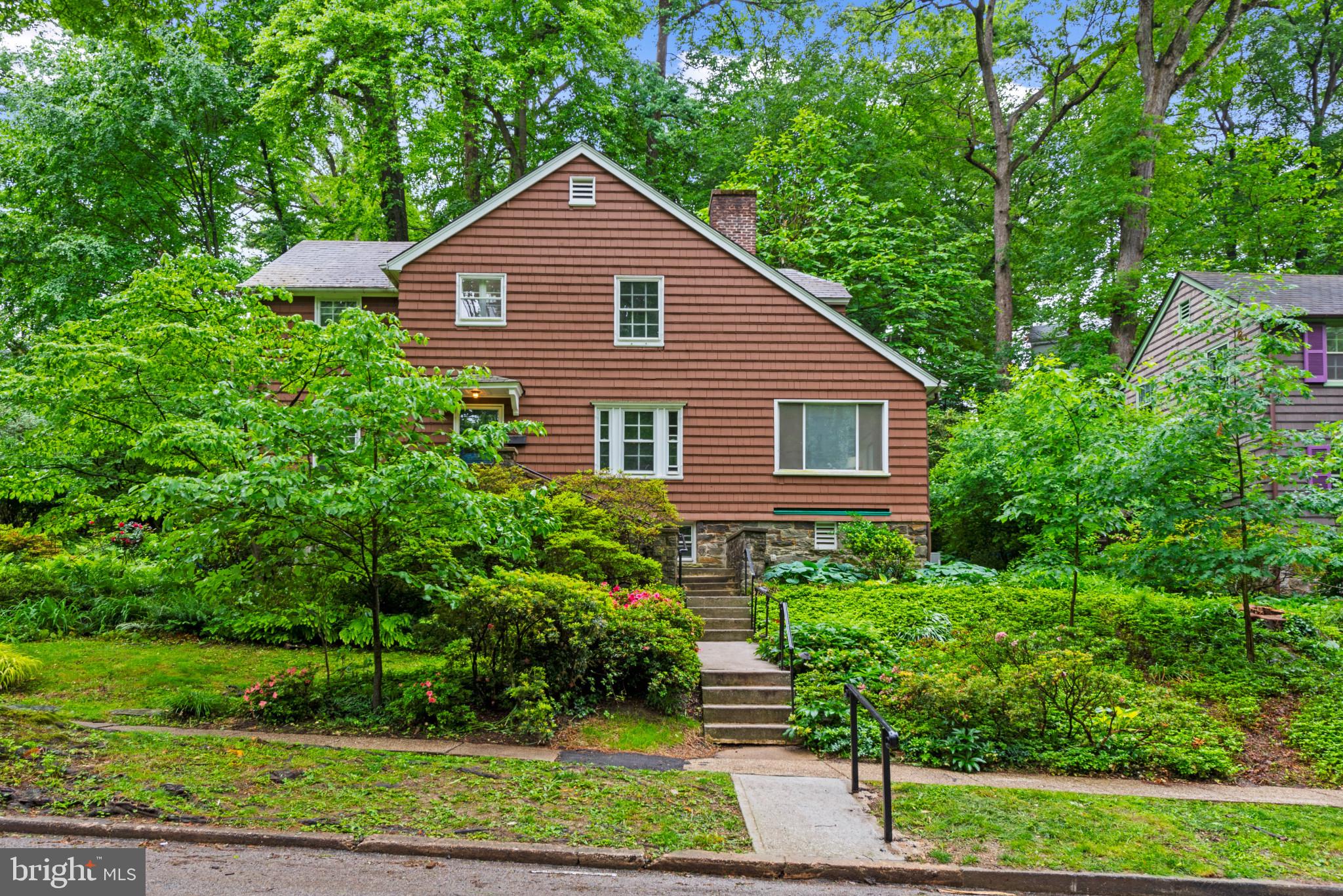 Tucked into the heart of Roland Park on picturesque Deepdene Road, this enchanting storybook cottage blends timeless charm with thoughtful updates. Set against a lush, terraced backdrop, this detached home offers 4 spacious bedrooms, 2 full baths, and a versatile floor plan perfect for modern living.
The main level features a warm, formal living room with a wood-burning fireplace, a gracious dining room, and a bright four-season sunroom — ideal for year-round enjoyment. The cozy den, complete with custom built-ins, provides the perfect spot for working from home or unwinding with a good book. A delightful butler’s pantry with a sink and additional cabinetry connects to the refreshed kitchen, which now boasts new quartz counters, updated flooring, and modern lighting.
Upstairs, the primary suite includes a private full bath, while three additional bedrooms share a second updated bath. Original hardwood floors throughout have been beautifully refinished, and the entire home has been freshly painted for a crisp, clean look.
Out back, the large rear deck offers a peaceful place to relax or entertain while enjoying the beautifully landscaped hillside—lush, green, and full of character. While there’s little traditional yard space, the surrounding greenery creates a private, serene atmosphere that’s both low-maintenance and visually stunning.
With a classic slate roof meticulously maintained by Fick Bros, this charming home is a rare value in Roland Park—offering the character you love, the updates you need, and a location that can’t be beat.