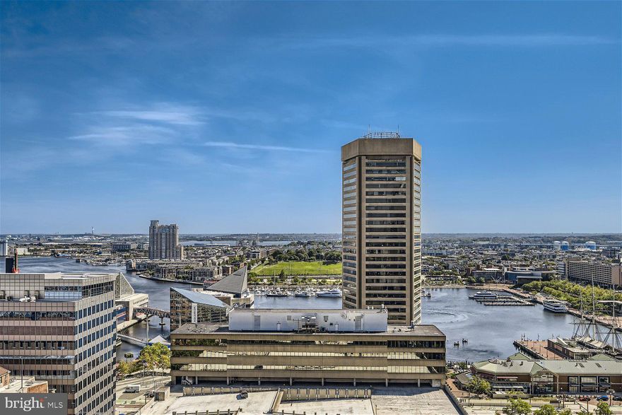 This stunning high floor south facing two bedroom two bath condominium offers an open floor plan filled with natural light and sweeping views of the Inner Harbor! Interior features include many upgrades including  hardwood floors throughout, upgraded kitchen with granite countertops and custom tiled bathrooms. The flexible living/dining room is perfect for daily living and entertaining with easy access to the private balcony with amazing views. Two spacious bedrooms including a primary bedroom suite with walk-in closet and private full bath with a custom tiled walk in shower and granite vanity.  414 Water Street offers residents full service amenities including 24-hour front desk staff, lobby security, outdoor swimming pool, event room, fitness center and business center. This residence comes with a highly sought-after storage room on the same-floor and an assigned parking space.  Live a turnkey lifestyle in the heart of downtown just steps to great dining, shopping, entertainment and minutes to I-83 and I-95. Available furnished. Price upon request.