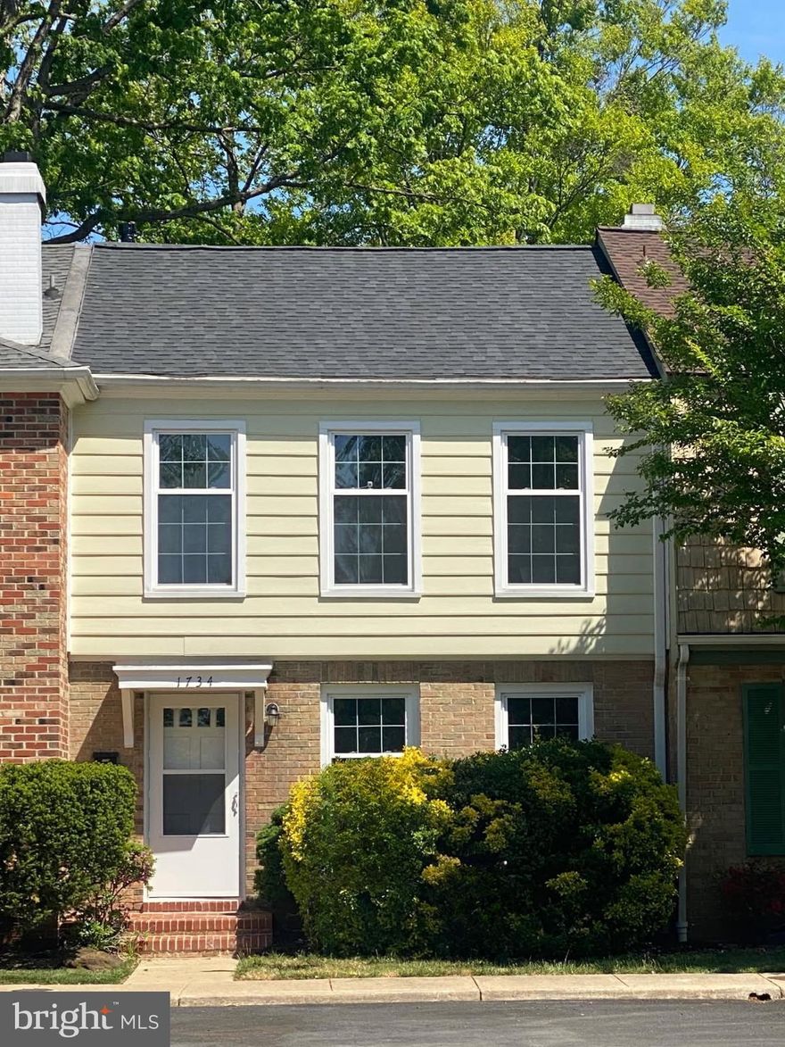 *** Brand new roof as of May 2026!!!*** Set within Crofton’s Georgetown Houses community, this classic brick Colonial blends tradition with lasting comfort. Its timeless exterior, defined by clean lines and a welcoming entry, sets the tone before you even step inside. It feels established. Solid. Like a home that has been well cared for and thoughtfully maintained over time.

With over 1,800 square feet spread across three finished levels, this interior row townhouse offers the kind of layout that simply works. The main level flows easily, giving you defined spaces without feeling closed off. Natural light pours through the windows, creating an everyday warmth supplied by the beaming hardwood flooring that makes the space feel inviting from morning to night. Whether you’re hosting a relaxed gathering, enjoying a stay-in evening, or starting your day with your favorite beverage, the layout adapts effortlessly to your routine. 

The living and dining areas connect in a way that feels intentional and comfortable, open enough for conversation, yet structured enough to create distinct spaces. It’s balanced, practical, and easy to live in. The recently upgraded kitchen with white cabinetry, stainless steel appliances, and marble-looking granite countertops will steal the show. Or it might be the large center island and oversized walk-in pantry? 

Upstairs, you’ll find three well-proportioned bedrooms and a full hall bath, thoughtfully arranged for privacy and functionality. The rooms offer flexibility for work, rest, hobbies, or whatever life calls for next. A convenient half bath on the main level adds everyday ease.

The finished lower level brings even more versatility. Envision a media lounge, home office, workout area, or creative space, it’s ready to become whatever fits your lifestyle best. With a walkout rear entrance, it offers separation from the main living area while still feeling fully connected to the home.

Built in 1967, this Colonial-style residence reflects the enduring appeal of classic architecture. The brick exterior adds timeless character, and the community itself is well-established and thoughtfully designed.
Step outside, and you’ll notice sidewalks and shared green spaces woven throughout the neighborhood. The setting feels connected yet tucked away, offering room to enjoy fresh air while staying close to everyday essentials. Shopping, dining, commuter routes, and local parks are all nearby, making daily routines smoother and weekends easier to enjoy.

Move-in ready and thoughtfully laid out, this Crofton home delivers comfort, flexibility, and a setting that makes life feel just a little more effortless. It’s not about flash, it’s about function, warmth, and a space that truly fits the way you live.

The best part? It already feels like home.