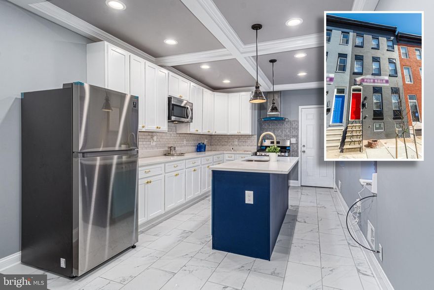 EXCEPTIONAL 3 LEVEL RENOVATION WITH OVER 2,200 SQ. FT. OF LIVING SPACE!  Features include wood flooring throughout, an inviting living room with tall, coffered ceilings & exposed brick, designer island kitchen with granite counters, ss appliances, and ample cabinet space, a main level half bath, upper levels with a Primary bedroom suite with a full bath, and 2 additional bedrooms with a hall bath, an unfinished basement that's perfect for storage, and a rear fenced patio!  Property is eligible for 10K Vacants to Value grant & 5K LIVE NEAR YOUR WORK GRANT - SAVE THOUSANDS!