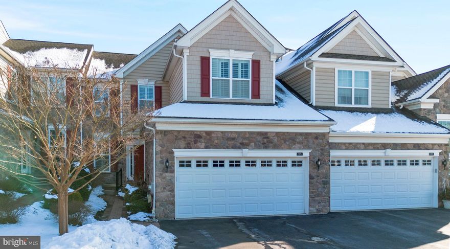 Magnificent Van Leer interior unit located in the 55+ section of White Springs, offering a totally private rear yard with great view and a prime location within walking distance to the pool, tennis courts, and clubhouse. This home features over 2,400 square feet of living space, plus an additional 900 square feet of beautifully finished basement.
The main level boasts a primary bedroom with cathedral ceiling and an expansive primary bath with double sinks, walk-in tub, oversized shower with bench, and walk-in closet with custom organizer. The suite offers convenient walk-through access to the laundry room. The gourmet kitchen includes a granite island, updated cabinetry, pantry with built-in shelving, upgraded stainless steel appliances, tile backsplash, recessed lighting, and breakfast bar seating for three. The open-concept layout flows seamlessly into the great room with cathedral ceiling, gas fireplace, and direct access to an oversized deck with privacy panels.
Also on the main level is a formal dining room featuring chair rail, crown molding, and wainscoting, along with hardwood flooring throughout.
The second level includes a cozy loft/office/den, Bedroom #2 with cathedral ceiling and walk-in closet, Bedroom #3, and a full bath with double sinks.
The recently finished basement is ideal for entertaining, offering a full bath, wet bar with quartz countertop, recessed lighting, and abundant storage.
Additional features include a security system, plantation shutters, interior sprinkler system, microwave, gas cooktop, self-cleaning oven, garbage disposal, dishwasher, and a 2-car attached garage with electric opener.
HOA fee covers trash removal, snow removal (including driveway and front walkway), common area maintenance, mulching, shrub trimming, roof, pool, tennis, pickleball, clubhouse, and fitness center. Fabulous location within walking distance to Providence Town Center.