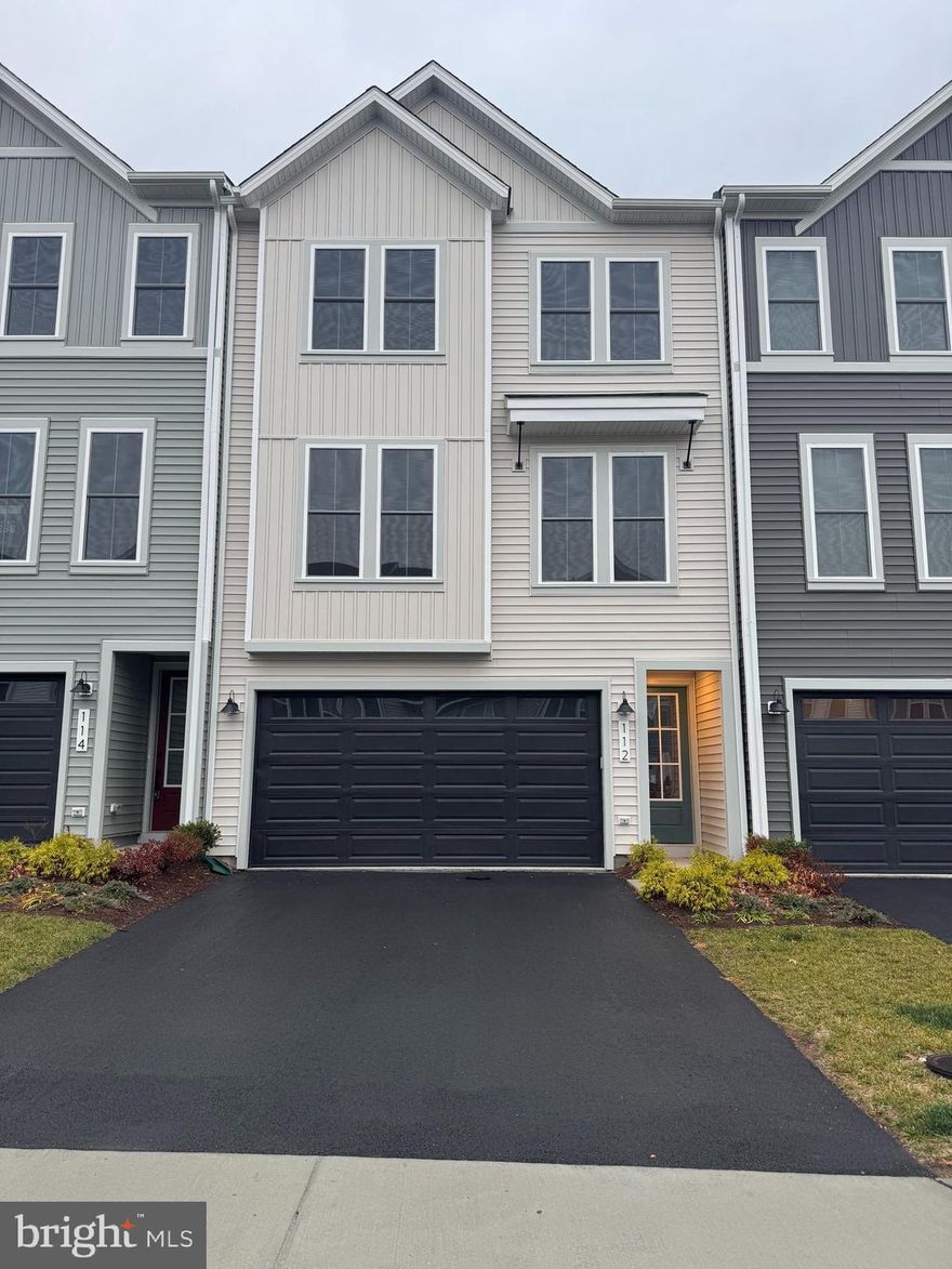 Beautiful townhome thoughtfully designed to combine modern style with everyday convenience. The lower level offers a spacious rec room that opens to a patio, creating an ideal space for entertaining or relaxing. Step outside to enjoy the backyard, perfect for quiet evenings or outdoor gatherings. At the heart of the home, the kitchen impresses with its walk-in pantry, blending charm and functionality for effortless cooking and hosting. A cozy reading nook provides a quiet retreat, while the main level's expansive deck invites you to unwind in the open air. The primary suite is a true sanctuary, featuring an oversized walk-in closet that adds an extra layer of comfort and organization. With its thoughtful design and spacious features, the Teagan 24-F2 is a home that makes every day extraordinary.

Experience life at Snowden Bridge, a premier master-planned community minutes from Downtown Winchester, where stunning Shenandoah Valley views and endless possibilities await. This vibrant neighborhood offers unparalleled amenities for every lifestyle, from a 15,000-square-foot indoor sportsplex to refreshing swimming pools, playgrounds, scenic paved trails, and more. Families enjoy the convenience of an onsite daycare center and elementary school, while a dog park and picnic pavilion add to the charm. Perfectly situated near major commuter routes like Route 7, I-81, and I-66, Snowden Bridge keeps you effortlessly connected to Northern Virginia