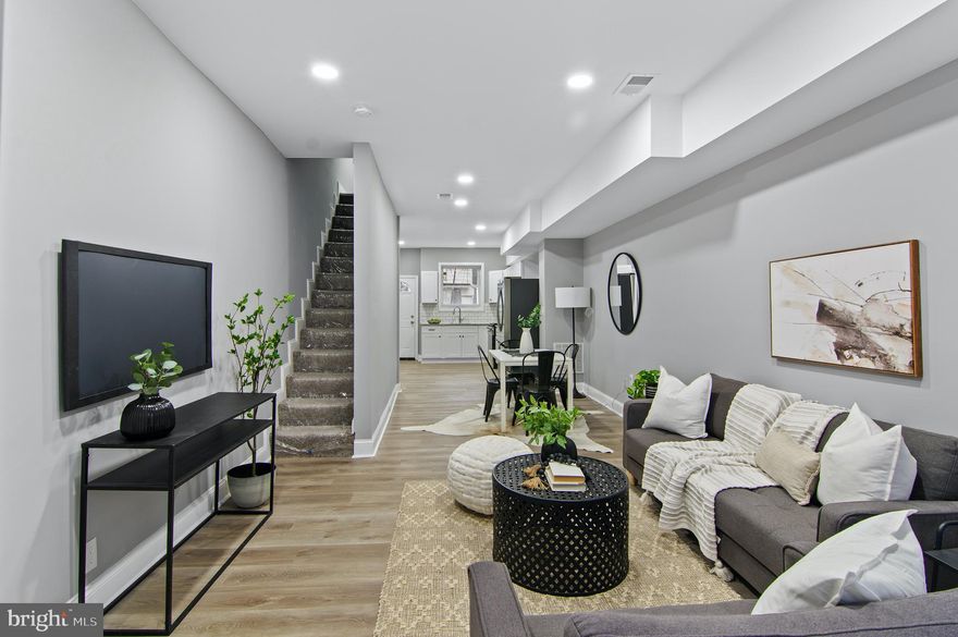 Introducing a stunningly renovated 3 bedroom, 3 full bathroom property nestled in the sought-after neighborhood of Pigtown/Washington Village. This exquisite home has been tastefully upgraded with attention to detail and boasts a modern appeal that is sure to captivate your attention. As you step inside, you'll immediately notice the luxurious vinyl flooring that gracefully flows throughout the entire property, offering both elegance and durability. The kitchen is a true masterpiece, featuring sleek white soft-close cabinets and gorgeous granite countertops, providing ample storage space and a stylish area for culinary adventures. 

The entire home is bathed in a warm, welcoming glow from the recessed lights that have been artfully placed throughout. With each space thoughtfully illuminated, you'll enjoy a cozy ambiance no matter the time of day. Update your living experience further with the newly installed central AC/furnace, ensuring comfort and convenience all year round. The three bathrooms offer contemporary tile finishes, creating serene spaces for relaxation and rejuvenation.

Conveniently situated just steps away from Carroll Park, this property offers a prime location that affords you the luxury of being close to various attractions. Cheer on your favorite team at M&T Bank Stadium, embrace the excitement of Horseshoe Casino, catch a game at Camden Yard, or practice your swing at Top Golf. Additionally, this remarkable home is easily accessible to major highways including 95 and 295, providing a seamless commuting experience. Whether you're exploring the city or heading out of town, you'll have no trouble reaching your desired destination.

Don't miss this opportunity to own a fully renovated gem in a vibrant neighborhood filled with endless possibilities. Schedule your viewing today and envision the perfect lifestyle that awaits you in this exquisite Pigtown/Washington Village property.