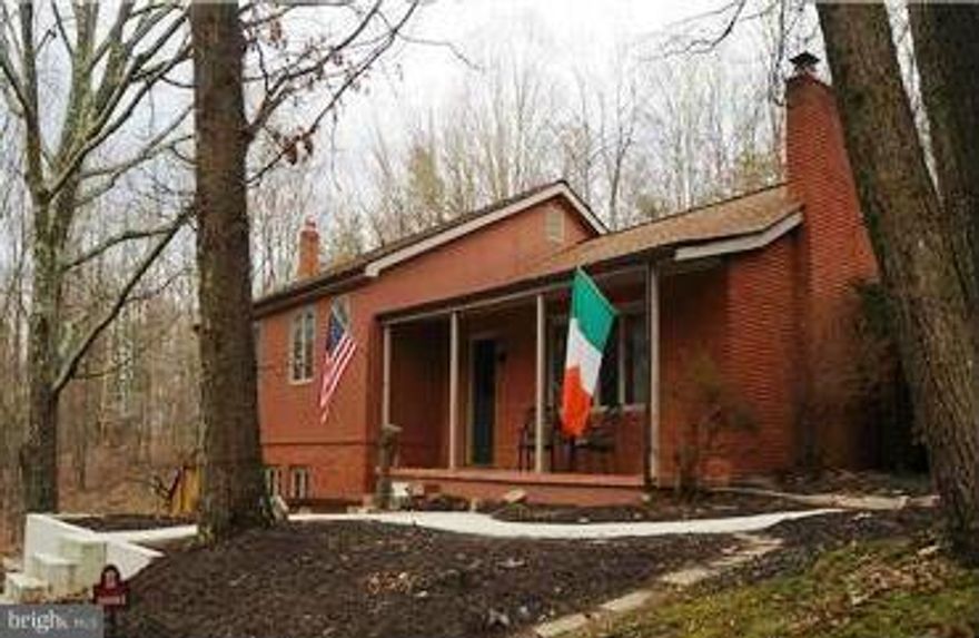 This is a truly unique home with many one-of-a-kind features hand crafted by local artisans. Recent updates including kitchen appliances, washer/dryer, heat pump, master bath and new hardwoods in the family room, A private, unrestricted location just minutes from town provides city convenience but in a private, wooded setting. Beautiful gardens and outdoor entertaining areas. Gorgeous throughout.