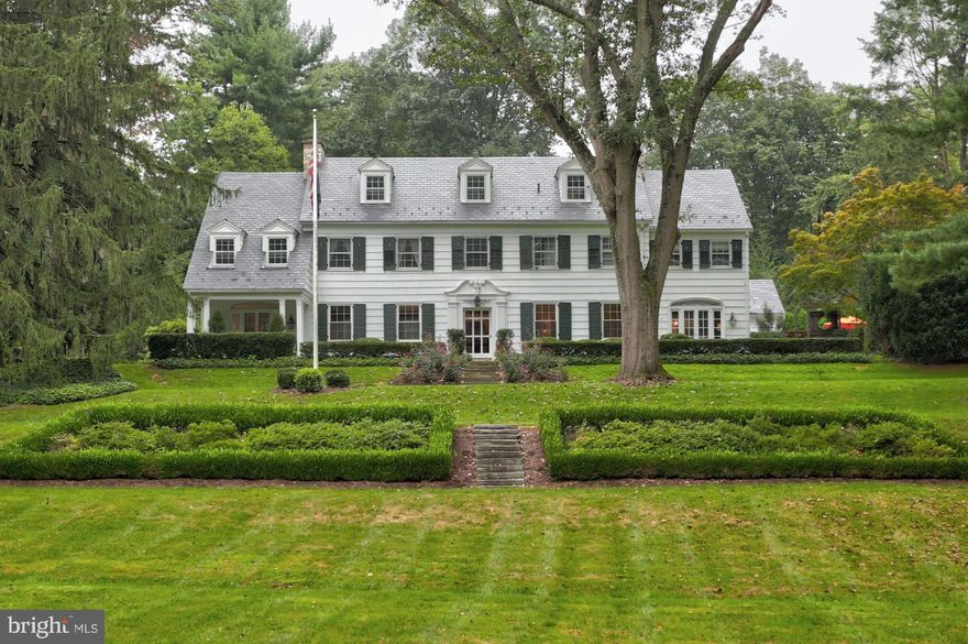 Situated on over 3 acres, this Federal style Colonial masterpiece is located in the highly desirable and prestigious Eshelman Road/ Lancaster County Club community. The home boasts over 6,500 square feet including 7 bedrooms and 6 bathrooms, with a dedicated office space, and in-law quarters/apartment. The 1st floor offers a grand main entrance, beautiful bamboo and hardwood floors, a large first floor laundry room complete with deep sink, a wet bar, mudroom, four seasons sun-room with pond views, as well as generous living and family rooms. This space would serve well for simple living or great entertaining. An old-world staircase leads to two full floors of generous bedrooms including an envious master suite with large closets and master bath complete with dual basins. The apartment contains a full kitchen and bath, punctuated with exposed beams and granite counter tops, and a private staircase. Bamboo and hardwood floors accent the homes flowing floor plan offering crown molding, stone fireplaces, and custom wood trim throughout! The exterior of the home offers mature trees, secluded privacy with extensive landscaping improvements. Two fish ponds and a private patio for comfortable outdoor living. A large drive for ample parking and privacy from the private Eshelman road. Aluminum clad, low maintenance windows alleviate painting woes and wear and tear. The home also features a three car attached garage.