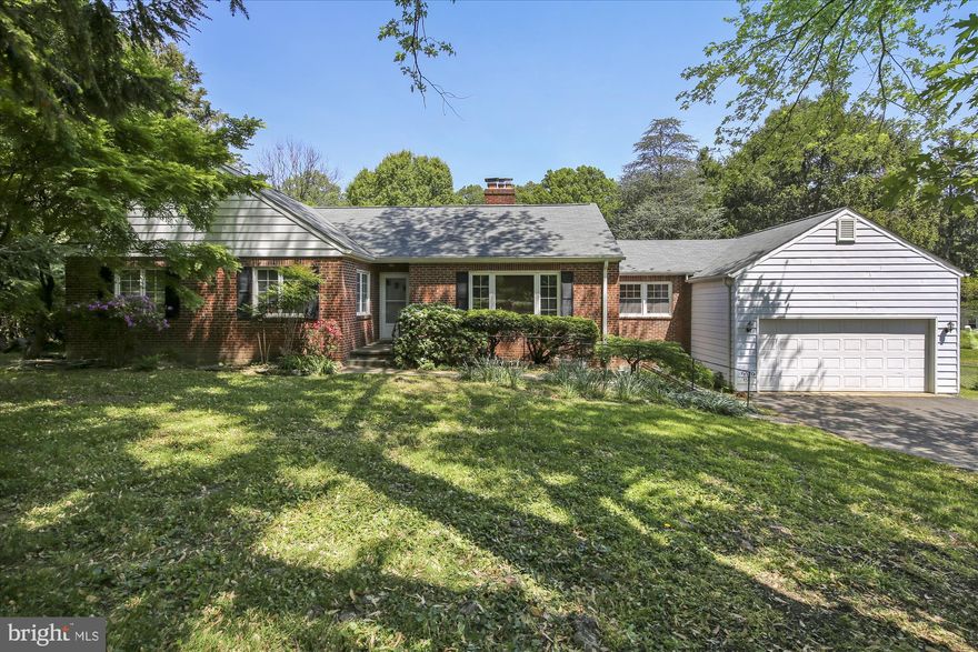 Don't miss out! Rare one level living with Updated kitchen & bathrooms; newer roof, windows & refinished hardwood floors throughout.  2 fireplaces, dining room that opens w/ french doors to sunroom & double lot totaling 1 acre! Hardwood floors on main level, kitchen with stainless steel appliances & granite counters. 2 car garage for parking and loads of storage available in walk up attic!! Enjoy evenings around your stone fire pit looking out on your private 1 acre lot!