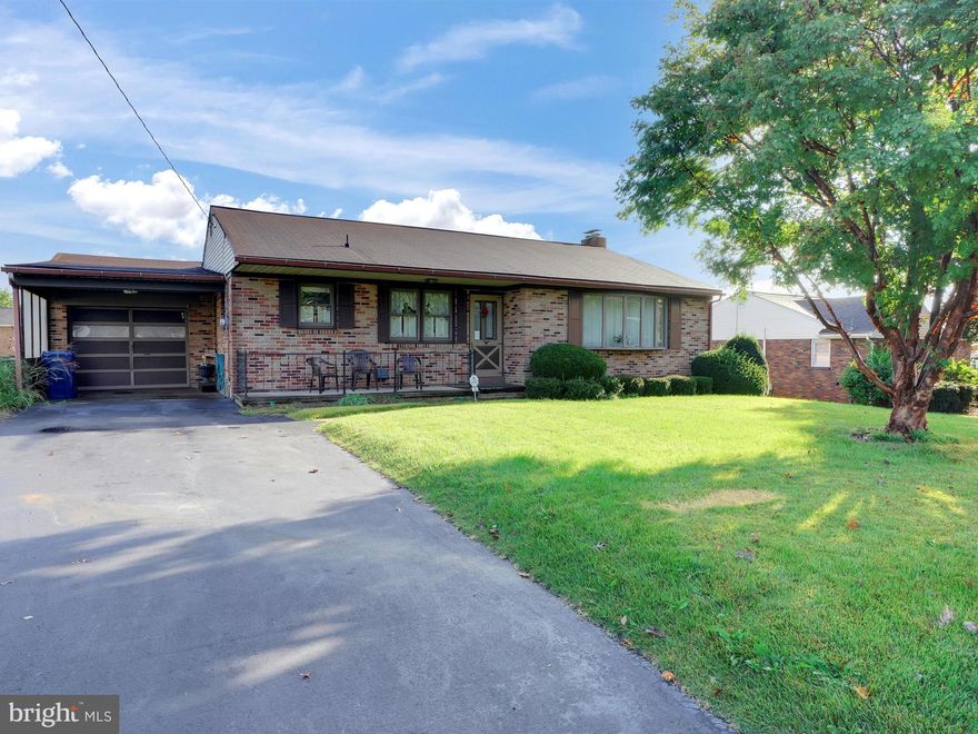 This is a solid well built brick home. Being sold  "AS IS" condition. Needs some cosmetic updates, but there is Sweat Equity to be made here. The 3rd Bedroom is currently being used as a Formal Dining Room. Seller says Hardwood Floors are underneath the Carpet, except for the Bathroom and Kitchen. All appliances stay, including the Jen-Aire Range in the Kitchen. The Sunroom has 2 heaters and skylights. Walk up Attic. Finished Basement with a  Woodstove, Kitchen area, and a Full Bathroom. One car garage and Carport. Nice flat yard with a Gazebo.