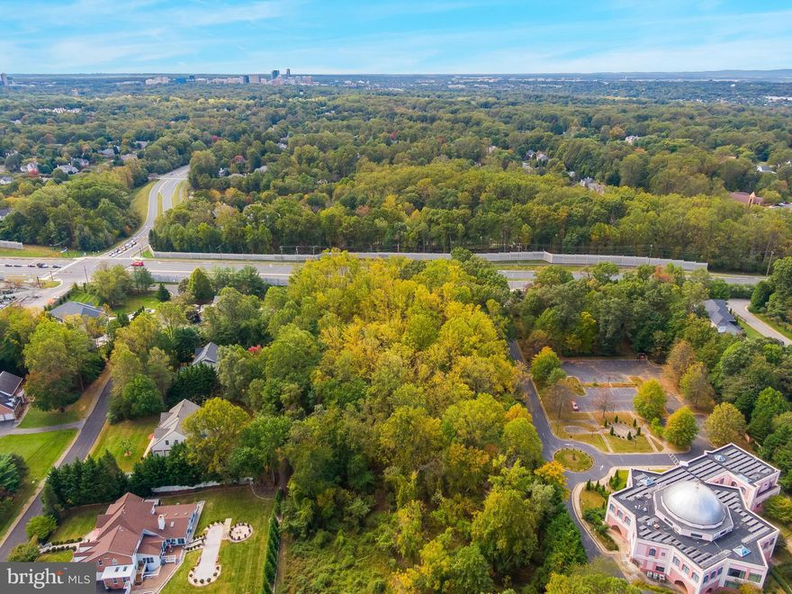 LAND IS NOT DIRECTLY ON LEESBURG PIKE!! YOU TURN ON SHAIN CT OFF OF LEESBURG PIKE TO ACCESS!!!!Beautiful lot in a prime Great Falls location, close to Great Falls Village, Tysons Corner, and Reston! This parcel of land is surrounded by luxury homes! There is public water and natural gas available to neighboring properties, and some septic site work was done previously, and available by request.