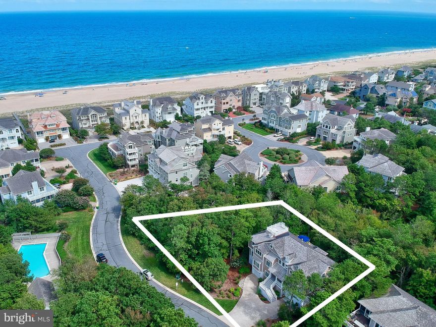 This stunning home is situated on a very large lot which is one of the most private in North Bethany.  Just 3rd lot from oceanfront and steps to the pristine private beach plus one of just 2 oceanside pools in North Bethany.  This boutique enclave of beautiful homes, is by far, one of the most desirable along Delaware's beaches. Interior designed by owner/ professional designer for relaxed luxury at the beach.  Many of the high quality finishes such as blonde French Oak hardwood 7.5" plank flooring, Visual Comfort lighting, Franke sink, Rohl fixtures, and the list goes on.  Almost completely furnished (Master bedroom, artwork and personal items and pieces are excluded) the furniture was carefully chosen just for this home.   Extensive decking including a roof top deck, private back deck for entertaining, and piped in gas for the crystal fire pit in the screened porch, add so much to the ambiance to this lovely sanctuary.  Built in 2015, the owner hasn't stopped upgrading this home.  Kitchen reno in 2020 with Quartz Countertops and backsplash,  lighting, and much more.  Also added in 2020, drop zone room, industrial sink and Speed Queen in laundry.   Elevator to all 3 levels. 6th bedroom is furnished as an office for remote working or school with whole house surge protection.  Meticulously maintained.  Enjoy Delaware's low property tax and no sales tax.