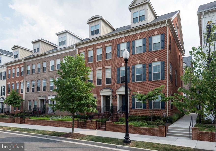 GREAT NEW PRICE! Beautifully finished 4-lvl TH in Ballston Row w/ 2,200SF+  of sun-filled living spaces! Blocks to new Ballston Quarter w/ restaurants + shops. Built in 2013, this 5BR/4.5BA home is perfect for entertaining w/ a spacious + open main level, Chef's kitchen + luxurious rooftop deck. 2-car gar. Only minutes to the Ballston Metro + commuter routes!