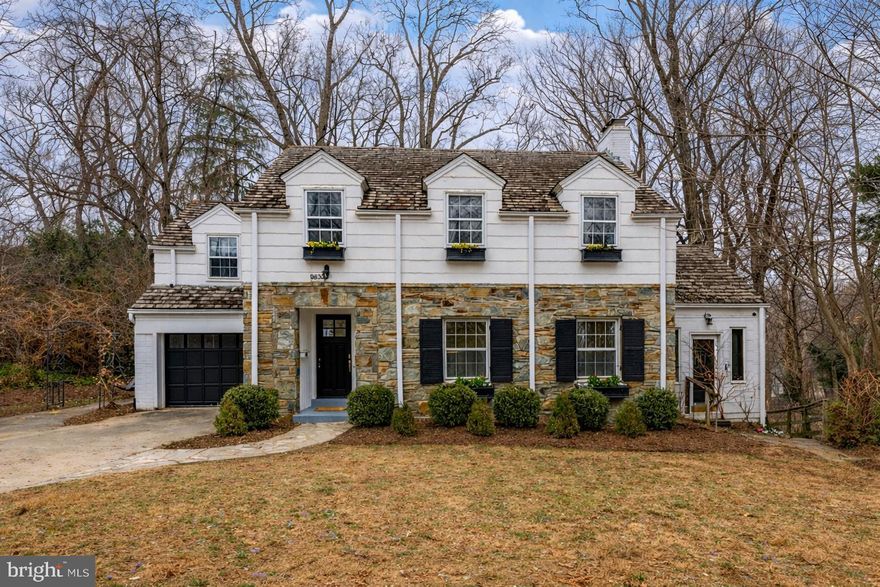 Set on an expansive, nearly 17,000-square-foot, park-like lot in the coveted Rock Creek Hills community, this classic colonial blends timeless architecture with modern updates, just minutes from Washington, D.C. Recent improvements include a brand-new kitchen and renovated bathrooms throughout. The light-filled main level offers gracious formal spaces, including a living room with wood-burning fireplace and custom built-ins, flowing seamlessly into the formal dining room. A newly renovated kitchen with all new appliances opens to a sun-drenched playroom with a separate exit and panoramic views of the surrounding trees. A stylish powder room, breezeway, and mudroom with interior garage access complete the level. Upstairs features three generously sized bedrooms, including a serene primary suite with an updated spa-like bath, plus an additional modern full bath serving the remaining bedrooms. The finished walk-out lower level adds flexibility with a spacious living area, fourth bedroom, full bath, office with outdoor access, laundry room, and ample storage. Outdoors, enjoy a fenced backyard with multiple patio spaces, organic garden, playground, and mature trees, offering rare privacy and a tranquil setting. Ideally located near Rock Creek Park, Kensington’s Antique Row, and major commuter routes. Voluntary membership in the Rock Creek Hills Citizens Association. Please note: Square footage is estimated and calculated by an independent third party; information is deemed accurate but not guaranteed.