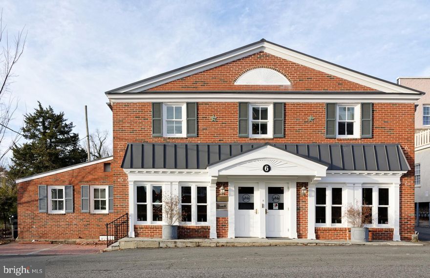 Prime commercial investment opportunity in the heart of Middleburg’s downtown historic district. Over 5,500 square feet, located one storefront south of main street with excellent visibility and walkability. The building will be delivered vacant, as the current tenant is relocating within town. Two-story layout with front and rear entrances and staircases allows for multiple tenants or flexible use. Features include private offices, open work areas, conference rooms, three half baths, supply/copy room and large break room. Two private parking spaces in front. Solid brick construction with standing-seam metal roof. Zoned C-2, permitting professional offices, service businesses, retail, fitness studio, and more. Town water and sewer. Walk to restaurants, shops, grocery, and post office. See documents section for C-2 zoning and historic district details.