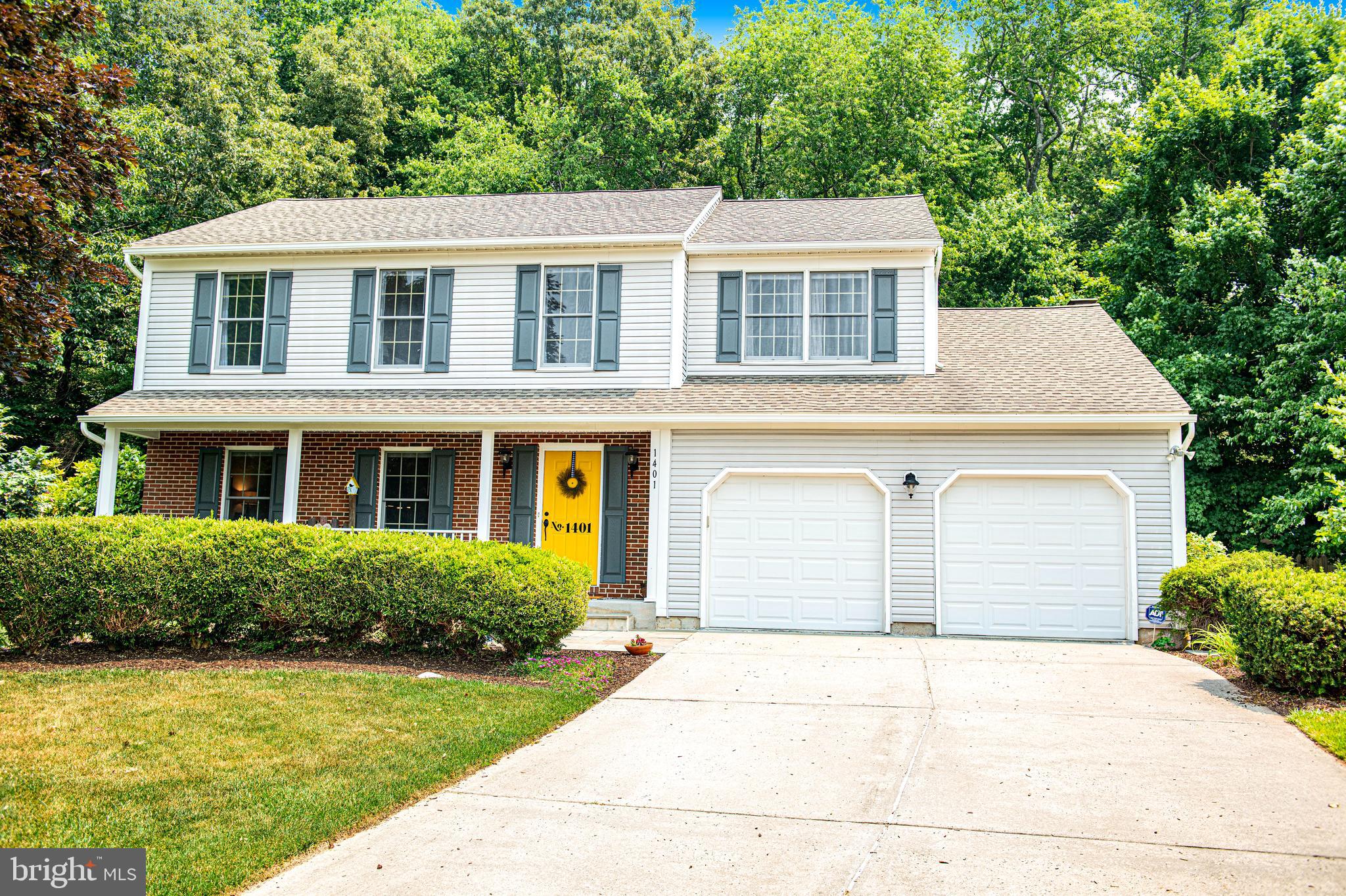 Welcome to 1401 Emily Court East in the community of Abingdon Reserve! This brick and vinyl porch front four bedroom, two and a half bath colonial with two car garage is sure to please! Perfectly situated in the cul-de-sac, this oversized .60 acre lot is beautiful and offers gorgeous views, it encompasses a partially wooded area with trails for walking, lovely landscaping and a backyard water feature, providing a place for peace , tranquility and relaxation! The gorgeous outdoor space and patio are perfect for grilling and chilling! The interior of this lovely property features an inviting foyer with slate-like tile leading to the formal living room and dining room both with crown molding and hardwood floors. The updated kitchen has maple cabinetry, granite counters, a custom tile backsplash, island, wall oven and cook top for ease when cooking! The oversized family room features a floor to ceiling brick wood burning fireplace. Updated sliding doors with interior blinds between the panes of glass are located in the kitchen and family room for ease of access to the rear exterior. An updated powder room completes the main level floor plan. The upper floor of this home notes an extremely large owners suite with vaulted ceiling, carpet, dressing area and walk in closet. The owners bath is also updated with tile flooring, single bowl vanity and newer tub and shower with tile surround. Three amply sized bedrooms are also located on the upper level with an updated hall bath as well featuring tile flooring, vanity, tub and shower with tile surround. The lower level is well appointed with a finished recreation room area with newer neutral laminate flooring. Laundry area with more than enough storage and a wonderful craft/sewing/hobby area is also present in the lower level. Further an exterior entrance to the rear yard is present in the lower level. Features include: Roof 30-year GAF Amish installed is 12 years old. HVAC installed December 2018, Water Heater 2019, New Sump Pump 2023. Don't miss this lovely home!