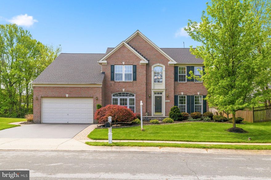 Move into one of the largest homes in sought-after Stone Manor. A grand two-story foyer with hardwood floors welcomes you, flanked by a private home office with French doors, ideal for remote work. The heart of the home is the expansive gourmet kitchen with a large eat-in island, a breakfast bar that seats four, stainless appliances, and a brand-new refrigerator (2025). Plenty of room for your long farmhouse table in the sun-drenched breakfast area.  

Just off the kitchen sits an oversized family room with a cozy gas fireplace and walls of windows that fill the space with natural light. A formal dining room and a flexible living room (perfect for a play area, too) adjoin each other. Main-level laundry room that doubles as a mudroom off the garage makes everyday living effortless, and all carpet on the main and upper levels is brand new.  

Upstairs, the impressive primary suite features a tray ceiling, dual walk-in custom closets, and an ensuite bath with double vanities, soaking tub, and separate shower. An attached sitting area offers flexible space for a nursery, workout room, or secondary office. Three additional generously sized bedrooms share the upper level with another full bath with double vanities. And with dual-zoned heating/cooling, there's no worries about being comfortable on any level!

The lower level is nearly fully finished with over 1,000 finished sq feet and includes a true fifth bedroom with egress window, a full bath with a tub/shower, and a spacious recreation area. Currently used as a home gym, there is an additional, already framed-out room making it easy to add even more finished square footage!

Outside, a paver walkway leads to the rear patio, ideal for entertaining. The roof was replaced in 2023! Driveway just resurfaced in April. Flat lots are rare in Eldersburg, yet 5650 Compton delivers exactly that— a half-acre lot with plenty of room for sports and play, or even a potential pool. This home is in heart of Eldersburg and is close to amenities, shopping, restaurants, and commuter routes.  Welcome home!
