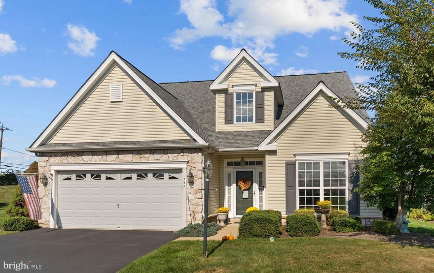 Here is your opportunity to own the Radnor model on a great premium perimeter lot in the highly desirable Traditions at Skippack active adult community. As you enter the bright two story foyer, the neutral decor throughout the home, featuring warm colors and light carpeting, provides a very welcoming and cheerful atmosphere. The entrance foyer has classic hardwood flooring and opens to a spacious dining and living room area . The classic hardwood hallway flows seamlessly into the bright kitchen and the carpeted family room. The inviting kitchen features white cabinetry, complimenting onyx granite countertops, and a convenient peninsula island, providing additional surface space for entertaining or for culinary activities. Stainless steel appliances and sink complete this wonderful kitchen. A dining area in the kitchen provides ample space for even larger dining sets. Across from the kitchen there is a very convenient counter that includes drawers for storage and overhead cabinetry. Two large pantry’s are also across from the kitchen. The large laundry room, with a utility tub and cabinetry, is also conveniently located off the main hallway, as is the entrance to the two car garage. Adjacent to the kitchen is a very comfortable family room with vaulted ceiling, ceiling fan, and a cozy gas fireplace, with stone and wood  mantle. Beyond the family room is a bright and cheerful sunroom, with neutral carpeting to enjoy relaxation time, and a scenic view of the large paver patio in the rear of the home to enjoy the outdoors on summer days. The first floor also includes a very convenient and large primary bedroom, with two walk in closets, an upgraded primary bath with a remodeled full glass shower, a wide granite counter with dual sinks, and neutral ceramic tile flooring. The second bedroom, with an adjacent full bath,  completes this area on the first floor. The second floor provides a carpeted loft area that provides ample space to relax or use as office space. The second floor also includes a very large finished storage area that could be converted to a third  bedroom or office. This home is conveniently located near the entrance to the community, and provides easy access to the community clubhouse, pool, tennis/pickleball court, and mail kiosk. Many improvements make this a carefree home for many years to come. They include; New roof ( 3years), new HVAC (2 years), remodeled primary bath, new carpeting on first floor (3 years), two large pantry’s, new microwave, several replacement windows, storage above the garage, and new chair height toilets.
This award winning community also includes a newly paved walking path that traverses the outer area of the community for convenient and safe exercise, new pickle ball courts, a tennis court, large heated saltwater pool, and bocce courts. The clubhouse features a great room with a new 75" TV, an exercise room, a billiards room, a library, and a large kitchen. This meticulously maintained home is truly in "move in" condition. Schedule your showing soon!