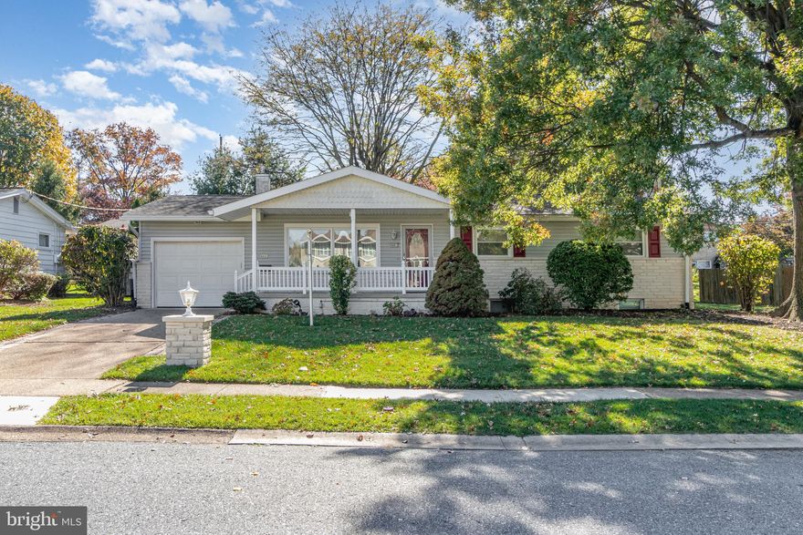 Welcome to your new home! Move right into this charming ranch located in the desirable Devon Manor neighborhood—close to all the conveniences you love. Relax on the inviting front porch, perfect for enjoying your morning coffee. Step inside to a spacious living room featuring beautiful hardwood floors that continue throughout the main level. The updated kitchen opens to a bright and airy sunroom with access to two patios—one with a retractable awning for shaded outdoor enjoyment.

The first floor offers a nicely updated full bath, a primary bedroom, and two additional bedrooms. The lower level expands your living space with a finished area ideal for a family room, office, or hobby space, plus another full bath and a generous laundry room.  Washer, dryer and refrigerator are included!  As the colder months approach, you’ll appreciate the attached one-car garage, driveway parking, and additional on-street options.  To complete this picture your home comes with a Generator.