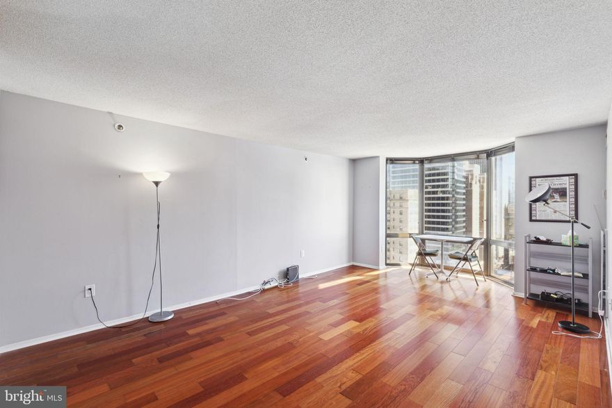 Light-filled one bedroom with stunning Center City views on a high floor of Wanamaker House. Enter past a small hallway with coat closet into the spacious living/dining area with wood floors and large floor-to-ceiling bay window that boasts spectacular Center City views. The open kitchen features white cabinetry, stainless steel appliances, and a new light washed “wood-like” floor. The sunny bedroom has another large floor-to-ceiling bay window with sweeping city views, a nice sized wall closet and new “wood-like” floors. Across from the bedroom is the full hall bathroom with single vanity, large mirror, and tub shower. There is a small wall closet and a nice-sized walk-in closet for additional storage. The Wanamaker House is located one block from Rittenhouse Square and provides easy access to both Center City and University City; residents enjoy a 24-hour doorman, a seasonal rooftop pool, a fitness center, and a parking garage available for an additional fee (subject to availability). All common areas were recently renovated including the lobby, hallways, meeting room, amenity lounge, and fitness center, designed by world- renowned architect Cecil Baker.