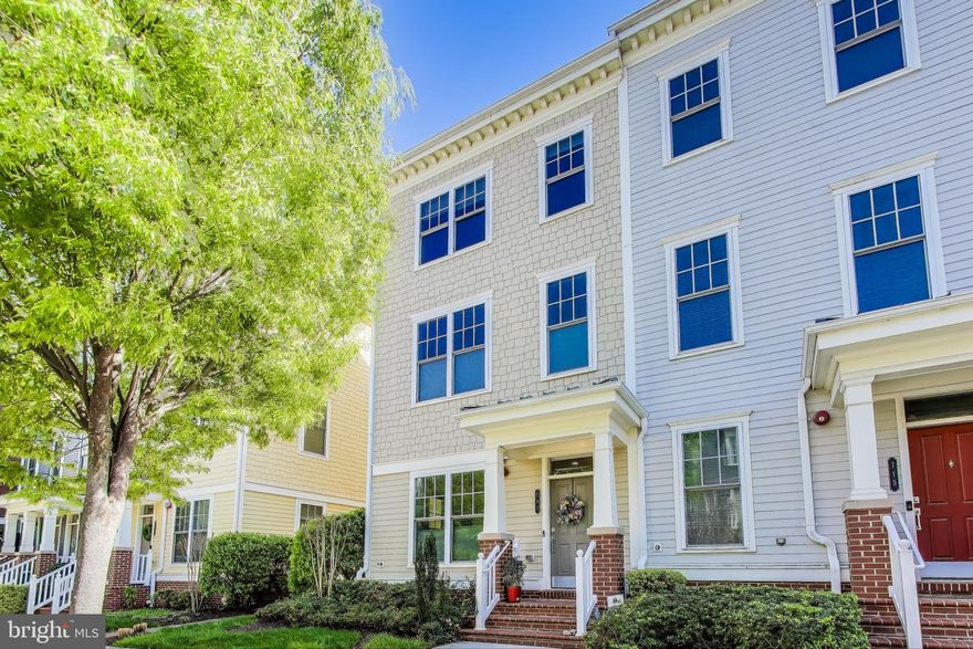 Welcome home to the sought-after community of Potomac Yard! Situated in one of Northern Virginia’s most convenient and rapidly growing neighborhoods, this stunning townhome is the picture of modern elegance, with luxurious finishes throughout all four levels. The beautifully designed carriage house offers incredible flexibility for multigenerational living or a private guest retreat! Inside the entry level you’ll discover a light-filled living room, featuring a cozy gas fireplace, large windows, and recessed lighting. Sleek hardwood floors flow seamlessly into the sophisticated gourmet kitchen, where rich wooden cabinetry, granite countertops, and a classic tile backsplash create a warm, inviting atmosphere. Modern stainless steel appliances - including a striking vented stovetop hood - complete the space with style and function. With the peninsula bar opening the kitchen directly into the dining room, this open floorplan is ideal for entertaining! Gleaming hardwood floors continue upstairs to the primary bedroom suite, boasting a large walk-in closet and a sophisticated en suite bathroom with a wide double sink vanity and oversized step-in shower. Both additional bedrooms include beautiful hardwood flooring, ceiling fans, and shared access to the second full bathroom in the hallway. On the top level of the home, you’ll find the perfect home office with a lovely window seat and gorgeous built-in shelving, plus a fantastic bonus room with a full wet bar as a second living space. The fourth bedroom and third full bathroom can also be found on this level of the home, making this space an ideal quiet space for guests. On the rear of the home, the carriage house offers a fantastic private in-law suite with an expansive wet bar! They’ll also enjoy shared access to your serene fenced brick patio for outdoor dining and relaxing. From here, access your two-car garage for convenient parking and storage. Optionally, the patio furniture, kitchen and top floor recreation room televisions, as well as the second refrigerator and shelving in the garage, may be made available for tenant use. This popular community offers an abundance of amenities including a dog park, playground, jogging and biking trails, and basketball and tennis courts. Plus you will be located close to everything you can think of! Minutes to Harris Teeter, Target, Fashion Center at Pentagon City, Old Town Alexandria, Del Ray, The Pentagon, Amazon HQ2, and Reagan National Airport. Quick access to Potomac Yard and Pentagon City Metro Stations, Route 1, I-495, I-395, and the GW Parkway makes commuting and getting around the DMV a breeze. This stunning home in such a desirable location won’t be available for long! Schedule a private tour of your gorgeous new home today!