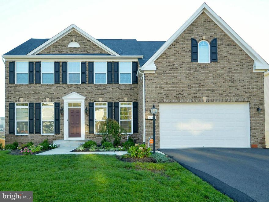 BETTER THAN NEW!....3 level Colonial. Many Extras/Upgrades to include: Gas fireplace insert, underground sprinkler system w/ rain sensor, surveillance system w/ cameras, Smart house control panel, granite counters, S/C conv. double oven, Morning Rm, Gourmet Island Kitchen, Luxury MBR Suite w/ tray ceiling & 2 walkin closets! Energy Star certified! Rec. Rm in walkout basement! GREAT LANDSCAPING!!!!