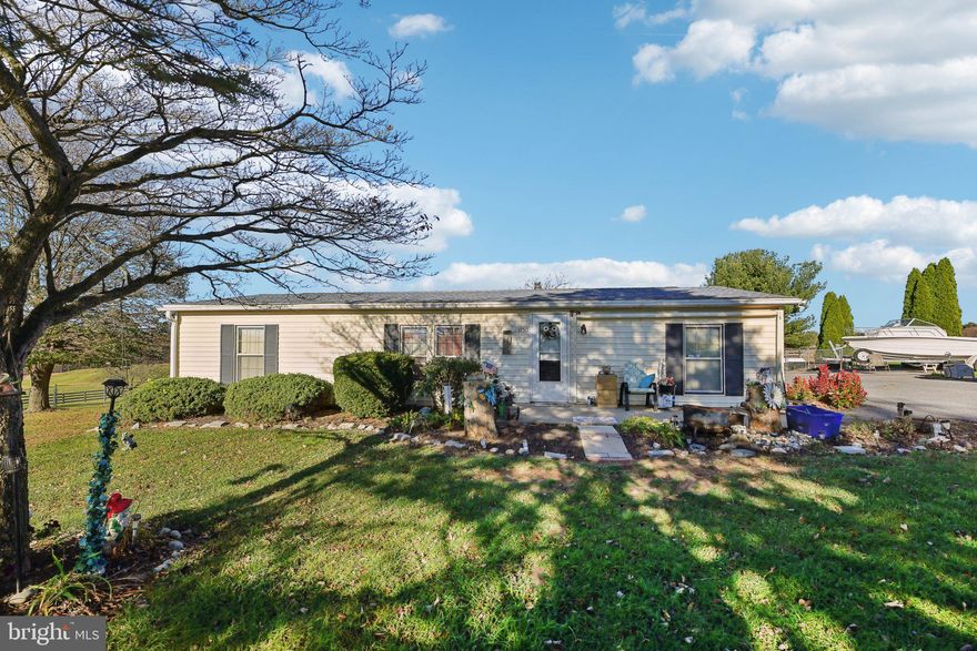 Offer Deadline Monday 11.18 at 1pm. This one of a kind property is ready for its new owners! Situated on just under 1 acre this 3 bed, 2 bath manufactured home has been lovingly maintained by its original owners. Enjoy picturesque views of the surrounding farmland and distant mountains. The backyard is partially fenced and boasts a spacious deck and multiple storage sheds. Don't forget to check out the detached metal garage! *This is an Estate Sale that has received a notice of default, sold As Is*