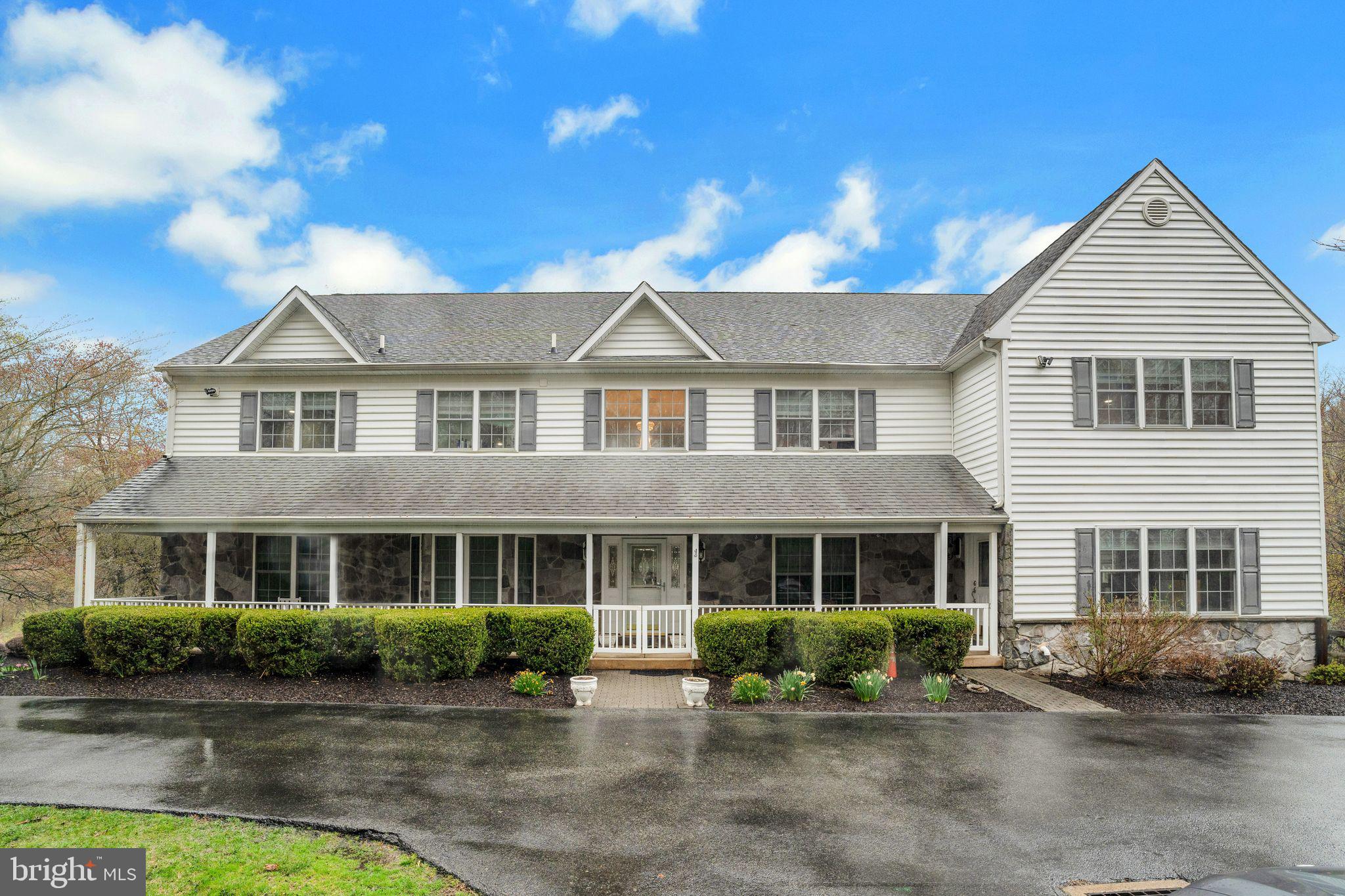 Welcome to 458 Arbor Way, Chester Heights Borough – a once-in-a-lifetime home! Nestled on 15.88 acres in the award-winning Garnet Valley School District, this stunning property offers direct and private access to Chester Creek. The main level features a show-stopping two-story great room with a two-story fireplace that seamlessly flows to the outside deck or into the updated eat-in kitchen, The first-floor primary bedroom includes a large walk-in closet, an en-suite bathroom with deck access. Additionally, you'll find an office,a spacious mud/craft/laundry room and a gym on this level.
Upstairs, discover another primary bedroom suite with a large walk-in closet, an updated primary bath, a private sitting room, and access to a private deck overlooking the property and creek. The second floor also houses three additional bedrooms, each with double closets, and a hall bath.
The finished, walk-out lower level is perfect for entertaining, featuring a wet bar, a beautiful stone fireplace, a full bath, an additional separate office, and sliders leading to a patio in the rear fenced-in yard. This level also provides access to a large three-car garage with two storage rooms.