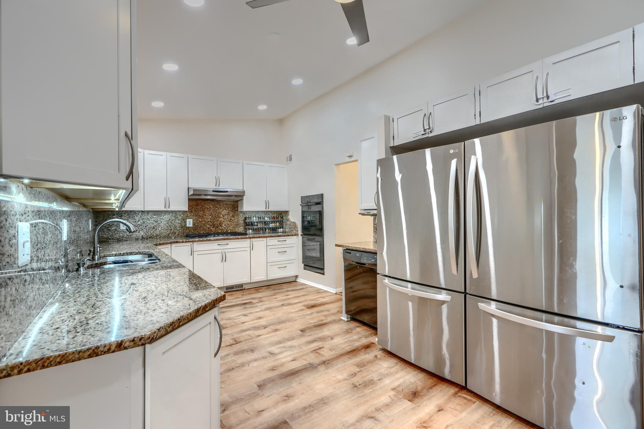***OPEN THIS SUNDAY 5/25/2025 from 10:30-11:30am*** Welcome to 2409 Lightfoot Drive a one of a kind house in the desirable Summit Park neighborhood! This expanded and updated home offers 6 bedrooms and 4.5 bathrooms, including a 2 primary suites with a luxurious en suite bath. The main floor features a functional layout with a gourmet kosher kitchen—equipped with white shaker cabinets, under cabinet lighting, 2 dishwashers, double wall oven, 2 full-size fridge/freezers, pantry space, and granite countertops/backsplash. Upstairs boasts 3 bedrooms and 2 updated baths, including a second en suite. The fully finished basement adds 2 more bedrooms and a beautiful full bath. Enjoy a large deck just off the dining room. Recent updates include roof, windows, insulation, kitchen, bathrooms, lighting, and deck.