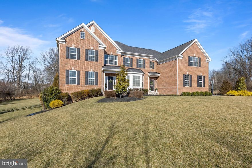 Welcome home to 165 Freedom Rider Trail, your new lovely home in Thornbury Township! Nestled on the very best lot, deep in the end cul de sac street in the  prestigious community of Preserve at Squire Cheyney in the award - winning West Chester Area school district.  This stately brick home sits proudly on 2.73 Acres, one of the largest lots in the neighborhood and the best views for relaxation and privacy.  Offering six bedrooms, 5 full bathrooms and a main floor powder room there is abundant room and space for everyone! The gently sloped front lawn sets the stage for your entrance through the custom built Federal style portico. As you enter this expansive grand two story front to back center hall, you will see the lovely open staircase ahead. Expertly designed and inspired  are updated features throughout such as new modern lighting fixtures on the entire first floor by designer George Kovacs, crown molding, wainscoting, lovely crystal chandeliers,  new Viking dishwasher, new stainless bowl, touchless faucet and newer disposal. The entire home has been painted with premier Sherwin Williams paint including all the ceilings! As you step into the grand formal living room, you will feel the warmth of the house with it's gleaming hardwood floors throughout the foyer area and continuing into the main level.  Take notice of the dining room's updated sparkling and bright new chandelier, it is the focal point of the room!  Steps away, your guests will enjoy relaxing in the formal living room where they can observe the lovely outside views and landscaping.  Step through the modern butler's panty and prepare your family & friends favorite coffee and latte. Once you're in the kitchen you'll be amazed with the ease of entertaining and food prep.  Breakfast bar seating is great when entertaining/hosting or a quick family meal. It's a real cook's kitchen complete with five burner gas stove , double wall ovens and granite counters, wait until you see the kitchen lighting, it's magnificent! Step into the informal kitchen Morning room if you need more dining area.  From there is a large maintenance free deck with beautiful views of the heated salt water pool, spa/as is and firepit. Privacy abounds as you enjoy the well manicured rear lawn and mature trees. The open floor plan love continues, as you see the huge two-story family room with a wall of windows soaring high. The gas stone fireplace warms up our chilly Pennsylvania nights! Completing the first floor tour is the rear home office with new hardwood...the private location affords the student or home office worker a quiet and discreet space.  Upstairs the primary bedroom suite will dazzle you! The large sitting area which can be used for additional flex/opportunities such as a workout/office/ or lounge space. There is an en-suite bath complete with separate water closet, double separated vanities and oversized shower.  Three additional bedrooms and baths on this level including an open loft area.  Moving to the lower level, there are two additional bedrooms and privacy barn door closures. Convenient full bath on this level will be enjoyed by your guests. There is so much living space here. This owner has installed these beautiful bedrooms and also a media room.  Enjoy your home gym here while relaxing watching your favorite movie! Enter outside on to your lovely spa inspired hardscaped patio, fire pit and heated salt water pool, such an oasis!  Convenient three car garage, home generator that is continuously monitored for efficiency, detached shed,  and an abundance of additional parking. Take a stroll or a hike in the Squire Cheyney Park, only steps away from your front door! You'll enjoy the rolling paved walking trail that surrounds the former Cheyney Farm.  Conveniently located to major routes and interstates. Easy drive to Philly,  Delaware and all points in all directions.  Lots of West Chester fine dining, shoppes and parks.
