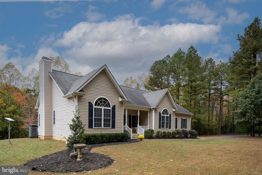 This beautiful home is situated on 10 private acres and is designed for both comfort and convenience, featuring the primary bedroom and ensuite bath on the main level.
The location is ideal for commuters, offering easy access to the Dahlgren Naval Base and Maryland, as well as a direct route to Fredericksburg. It is also perfectly positioned between two commuter rail stations for those traveling north for work. The property is surrounded by mature trees for maximum privacy, providing a serene setting for family gatherings on the rear deck and back patio, while the cleared areas offer ample space for various outdoor activities.
The main level boasts an open floor plan that is excellent for entertaining, featuring a fully equipped kitchen, a formal dining room, and a family room with a gas fireplace that opens onto a screened porch. In addition to the primary suite, the main floor includes two additional bedrooms and and additional 1 full and 1 half bathrooms. The upper level offers a secluded bonus room that could serve as a private office or an extra bedroom, while the partially finished walk out basement provides a flexible space ready for your family's specific needs. If you are looking for privacy this is the home.  Come visit and see what peace and quiet sound like!