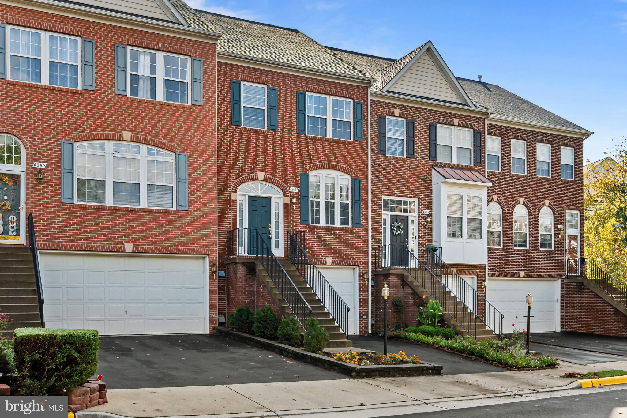 Improved Price!! Step inside this beautifully maintained townhouse, where soaring ceilings, hardwood floors, and an open three-level layout create a bright, inviting atmosphere. Generous bump-outs on every floor add versatility and natural light, making each space feel both expansive and comfortable.
The updated kitchen shines with quartz countertops, resurfaced cabinetry, and newer stainless-steel appliances (refrigerator, microwave, and dishwasher). Upstairs, the primary suite offers a walk-in closet, a sunny sitting area, and a spacious bath with double vanity, soaking tub, and separate shower.
The finished lower level provides extra flexible living space—perfect for a home office, gym, or media room. Thoughtful upgrades throughout include a roof replacement (2018), new main and lower-level flooring (2018), furnace (2021), and even an EV charger in the garage (2020).
Enjoy park views from the front of the home, filling the interior with sunlight. The location is unbeatable: just a short stroll to Wegmans, parks, wooded trails, sports courts, and playgrounds, with quick access to I-66, Rt. 28, Rt. 50, Fairfax County Parkway, Fairfax Corner, and Fair Lakes.