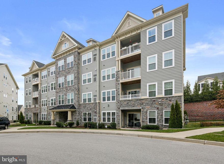 Immaculately maintained  condominium located in the premier Active Adult Community of Waverly Woods West. Two bedroom condo light-filled windows, a modern open concept living area, neutral color theme, recessed lighting and gourmet kitchen. The kitchen is fully equipped with granite counters, tile backsplash, 42” soft-close cabinets, premier stainless steel appliances, pantry and large island with a breakfast bar. The primary bedroom suite adorned with a walk-in closet, second closet and luxurious bathroom with a glass-enclosed tile shower.  Second Bedroom has access to front hall and bedroom. Extra storage room encased with Gladiator Storage System. Community amenities include plenty of parking, outdoor swimming pool, community center with gym, common space and meeting rooms, tennis courts and play area. Close to great restaurants and stores.