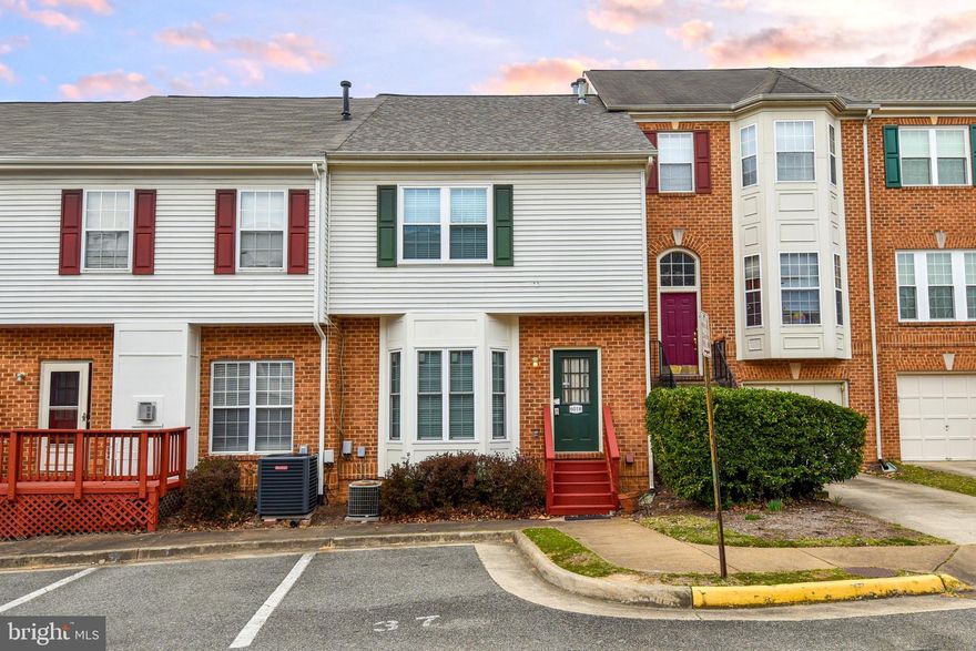 3 Bedroom. 2.5 Bathroom Townhouse. The main level boasts hardwood floors and a beautiful double sided gas fireplace. Stainless Steel appliances and granite countertops adorn the kitchen with a cozy sitting area to enjoy the fire by. The primary bedroom features a vaulted ceiling, walk in closet and en suite  bathroom with soaking tub and tiled shower. 2 additional bedrooms and a full bath on upper level. A bonus finished lower level has a rec room with another half bath. Outside is a concrete patio to enjoy warm nights on.  There is a 2 Car Garage. Located in a great neighborhood for walking - nearby is a park with a nature trail and walking distance to Lake Barcroft. There is a bus stop right out front that runs straight to the Pentagon. Easy commute to DC.