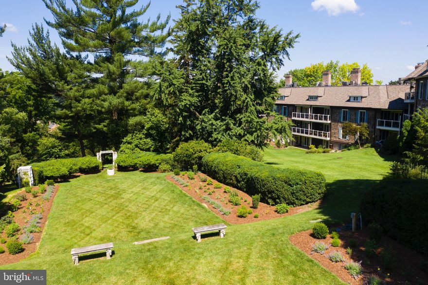 In Baltimore County's 9.4 acres Devon Hill Community, this spacious and beautiful 2 story unit  stands above the rest. Take in the spectacular sweeping views from both upper and lower covered balconies of this 2,372 square foot, stylish home - the result of a 7 month, high-end renovation. Nothing to do but move your furniture in to enjoy these amenities: * Fireplace in both living room & family rooms,  *specialty solid white oak 8 inch wide floor boards & 9' ceilings,  *3 exquisite full bathrooms,  *finely crafted built-ins & handsomely outfitted walk-in closets,  *elegant light fixtures & Miele appliances. Ground floor entry with no steps and a potential ground floor bedroom (now a den) with full bath nearby provides great living flexibility.  Upper level features a primary bedroom with en-suite bath & walk-in closet, guest bedroom with large cedar closet, hall bath and  family room with  built-in office space & fireplace.  As the only unit  with 2 garages, this is a one-of-a-kind offering for the discerning buyer,  who will enjoy Devon Hill's incomparable  manicured  setting with a gazebo and other outdoor entertaining areas. Dedicated, spacious  8'x 12" storage room in lower level of building.  Additional parking in area in front of unit. Can't think of another offering in Baltimore's condo market which checks all the boxes, including low county taxes, a pastoral setting and lovely finishes throughout.  Floor plans available.