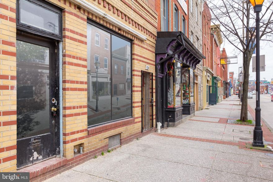 INCREDIBLE RETAIL OPPORTUNITY IN THE HEART OF FELLS POINT!  Main level retail space perfectly located in highly traveled Fells Point and 1/2 block from the newly renovated Broadway Market. Available space has hardwood floors, a powder room, basement storage, & access to the shared patio. Perfect for a small boutique or coffee shop. Triple Net Lease!