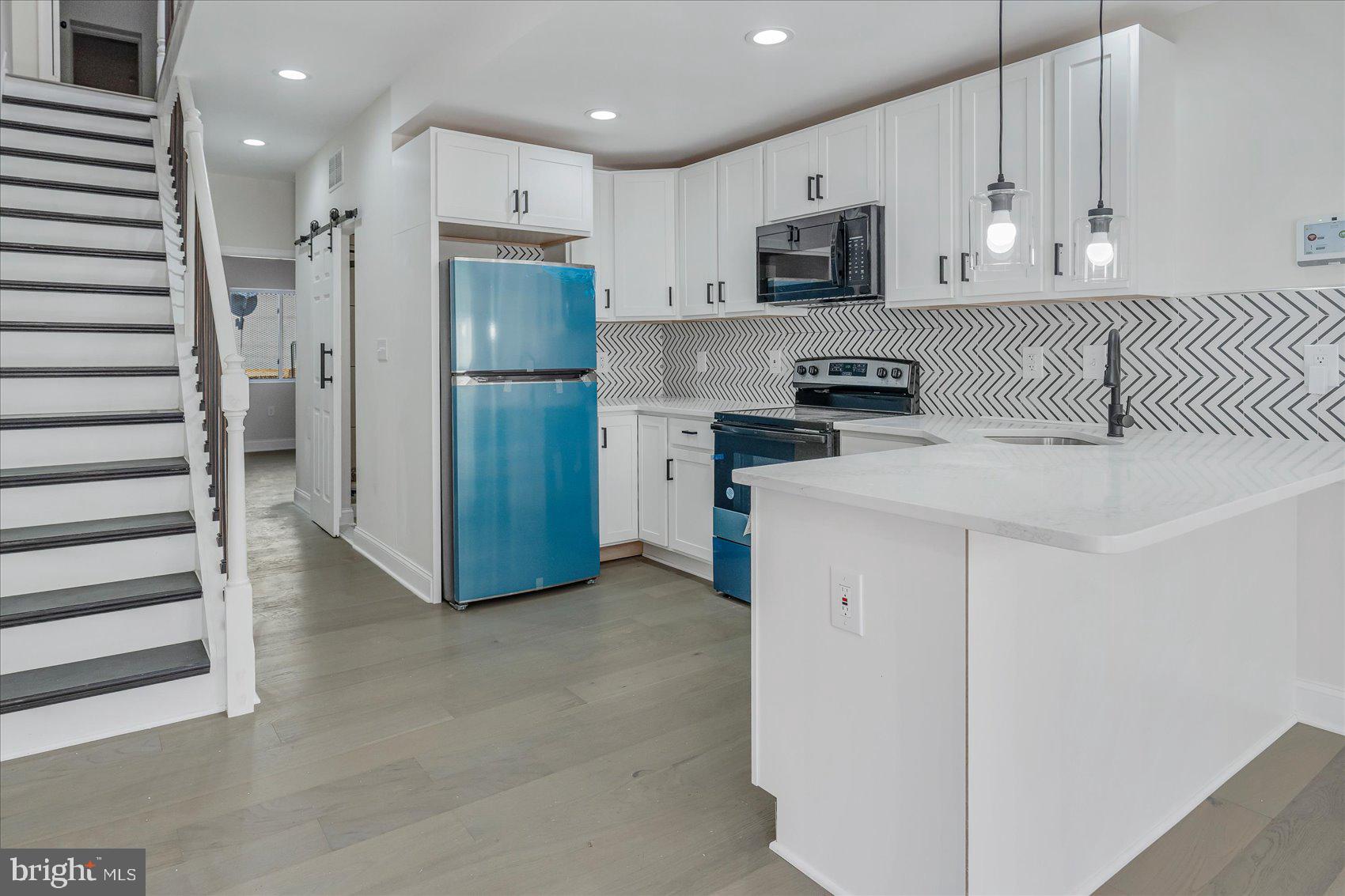Welcome to this charming, newly renovated townhome located in the heart of Baltimore, Maryland! With 3 bedrooms and 1 bath, this affordable property is perfect for first-time homebuyers or investors looking for a great rental opportunity.
As you enter the home, you will immediately notice the stunning updates and modern finishes that have been carefully chosen to create a comfortable and welcoming atmosphere. The open floor plan on the main level provides an ideal space for entertaining guests or relaxing with family. The spacious living room flows seamlessly into the dining area, making it easy to host dinner parties or family gatherings.
The newly updated kitchen features all new stainless steel appliances, granite countertops, and plenty of cabinet space for all of your storage needs. The back door leads out to a private yard, perfect for enjoying warm summer nights or outdoor BBQs.
Upstairs, you will find three well-appointed bedrooms, each with ample closet space and plenty of natural light. The updated bathroom boasts modern fixtures and a new vanity.
The unfinished basement provides endless possibilities for additional living space, storage, or a home gym. The potential is truly limitless!
Located in a convenient and desirable location, this townhome is just minutes away from local shops, restaurants, and public transportation. With its affordable price point and endless potential, this property won't last long. Don't miss your chance to make this house your dream home or investment opportunity!