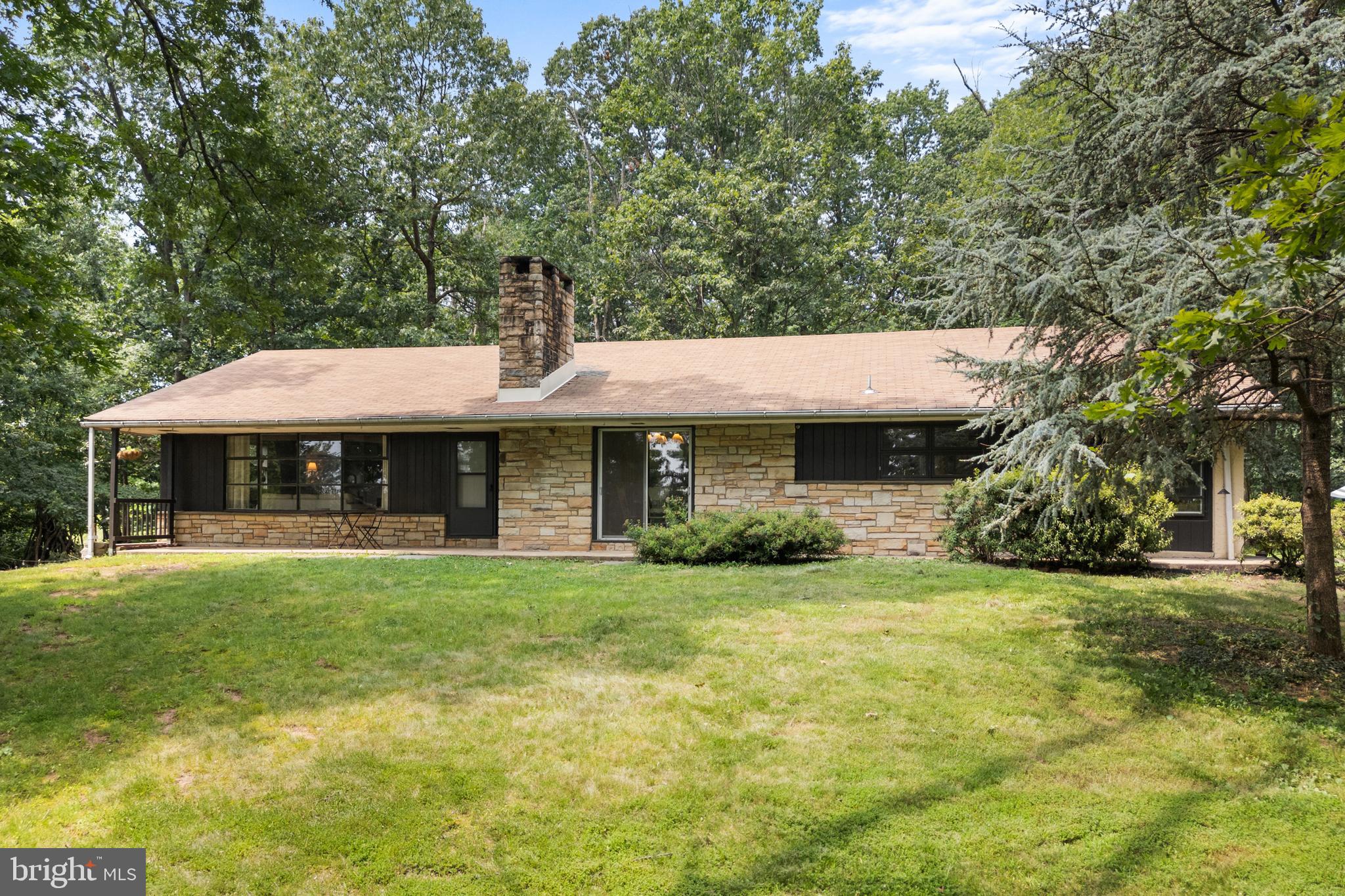 Charming Ranch Home on Nearly 4 Private Acres in Souderton School District!
Discover peace, privacy, and picturesque surroundings with this beautifully updated and maintained ranch-style home, perfectly situated on 3.85 wooded acres in the highly sought-after Souderton Area School District.
Nestled at the end of a long winding driveway, this home offers a serene, nature-filled setting with mature trees, vibrant landscaping, and a spacious brick patio—ideal for relaxing or entertaining outdoors. A detached 2-car garage features a large workshop and bonus storage loft, with plenty of additional parking.
Step inside through the enclosed sun porch into an inviting open floor plan, new porcelain tiled kitchen , flows through the upgraded eat-in kitchen, with oak hardwood dining, and living rooms. A stone accent wall subtly separates the dining and living areas, while a large bay window offers peaceful views of the front yard. The kitchen is equipped with ample cabinetry, a pantry, built-in microwave and wall cabinets, new double farm sink, electric range, dishwasher, and more.
Enjoy:
3 spacious bedrooms with original hardwood floors and walk-in closets
2 full bathrooms, including an oversized hall bath and a private ensuite in the primary bedroom
Sliding doors off the dining room that lead to the gorgeous front patio
The expansive lower level is partially finished and ready for your vision—complete with a cozy stone fireplace, laundry area, and a finished room ideal for a 4th bedroom , home office or remote learning setup.
Whether you're into hiking, kayaking, or skiing, you'll find outdoor recreation close by. Plus, this property offers easy access to major travel routes—just minutes from the PA Turnpike, Route 113, and Route 29 for a smooth commute to Philadelphia and beyond. Whole House Generac Generator included with owned propane tank.
📍 Souderton School District | 3 Beds | 2 Baths | Nearly 4 Acres
🚗 Detached Garage with Workshop | Private Driveway | Outdoor Living Space
🏡 Your private retreat awaits—schedule your showing today!