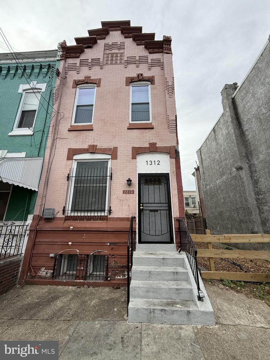 Discover this stunning row home nestled in the vibrant Glenwood neighborhood of North Philadelphia! Completely renovated from top to bottom in 2022, this exquisite property features 3 bedrooms and 2 full bathrooms. The first floor welcomes you with an open-concept layout, showcasing gleaming new hardwood floors and fresh paint throughout both levels. Step into the spacious living room, adorned with recessed lighting, which seamlessly flows into the dining room. The dining area includes a wall A/C cover for added comfort.

The kitchen is a true showstopper, equipped with recessed lighting, ample wooden cabinetry, large tile flooring, a stylish tile backsplash, and essential appliances including a refrigerator, stove/range, and range hood. From the kitchen, access the mudroom at the rear, which leads to an upgraded full bathroom featuring a single vanity, toilet, tub with sliding glass doors, exhaust fan, and elegant tile finishes. The private rear yard offers a courtyard-like setting, perfect for outdoor gatherings in warm weather.

Upstairs, the second floor boasts a spacious master bedroom along with two additional well-sized bedrooms, all with beautiful new hardwood floors and fresh paint. The hallway full bathroom mirrors the modern finishes found throughout the home. The fully finished basement provides tile flooring and a separate laundry area with utility sink and washer/dryer hookups.

This home is move-in ready, with a brand new electric hot water heater and electric baseboard heaters installed in 2022, and a new rubber roof added in April 2023. The property is conveniently located near SEPTA bus stops and public transportation, just a few blocks from the SEPTA Orange Broad Street Subway Line. With a high Walk Score, you'll be minutes away from Temple University, major cultural attractions, and the bustling Center City.

Priced competitively, this home is perfect for first-time buyers or as an investment property, with rental potential in the area ranging from $1,200 to $1,600 per month. Don't miss out on this incredible opportunity!