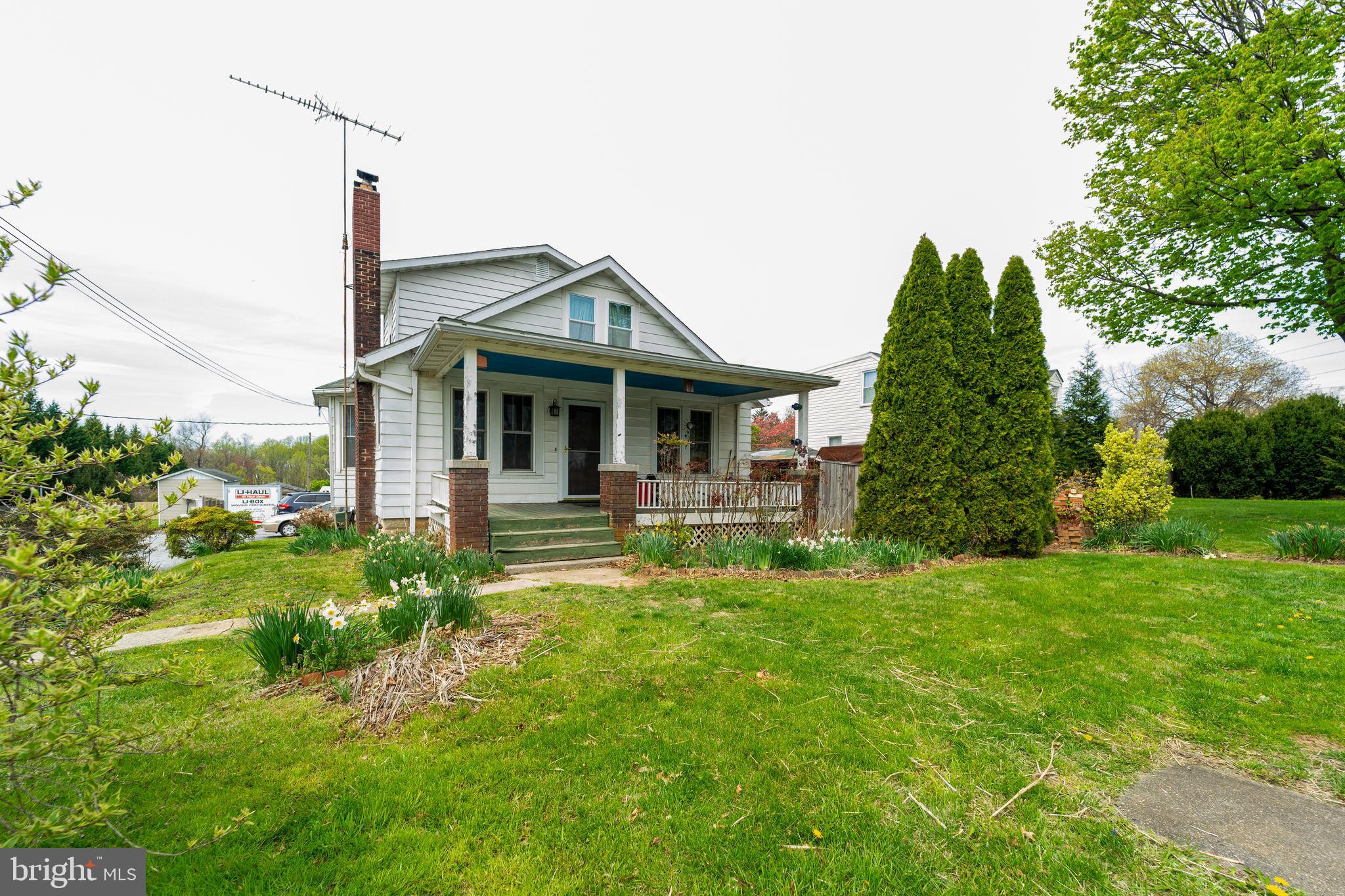 Home has lots of character, wood floors, very solid. There is a separate 1 bdrm cottage in the back. May be able to add on with a special hearing. Zoning is R-2 which allows a one square foot sign for a home office. Buyers to do own due diligence to confirm zoning, what is allowed, etc. The main house has 3 bedrooms and 2 bathrooms. Cottage has 1 bedroom and 1 bath. One year home buyer warranty included.