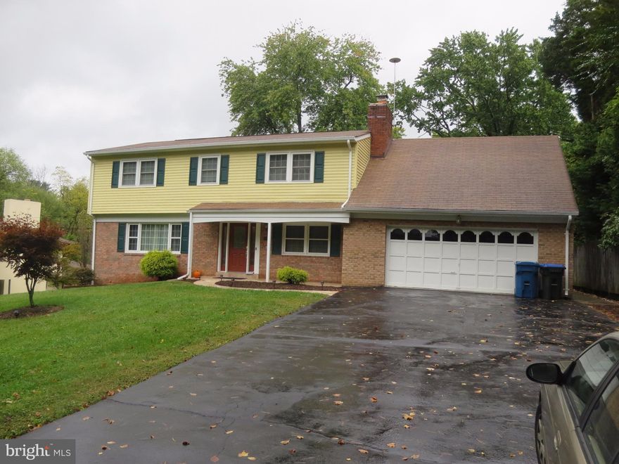 Come see this spacious home.  Huge back yard with a patio and play area.  Upgraded kitchen with granite counter tops, hard wood floors, and an over sized garage.  True walk in closet for master bedroom, more room than most bedrooms have.  Basement has extra bedroom, living area, storage, and cooking area.  Close to everything, priced to move so hurry this will not last long.