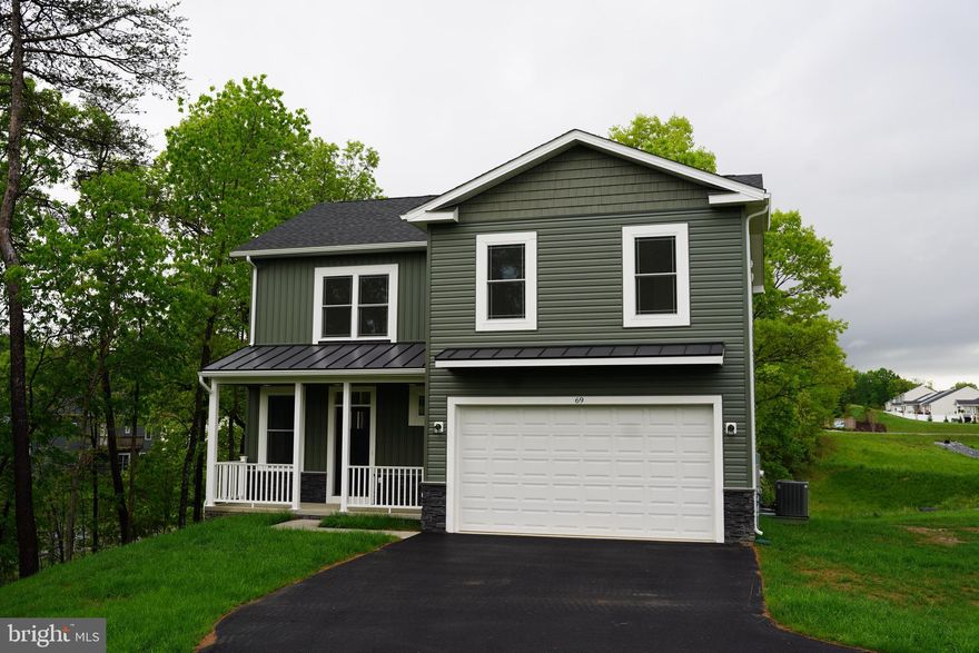 This newly constructed 4-bedroom, 2.5-bathroom colonial home on .43 acres is a must-see! The spacious primary suite features a luxurious soaker tub, a beautifully tiled walk-in shower, and an oversized walk-in closet, offering the perfect retreat. Conveniently located on the bedroom level, the laundry room adds to the home’s functionality. The open floor plan seamlessly blends living, dining, and kitchen spaces, all enhanced by elegant luxury vinyl plank flooring. Enjoy outdoor living with a 10x10 TimberTech deck with vinyl railing, ideal for relaxing or entertaining. The purchaser is responsible for the transfer tax. Don’t miss out on this stunning home!