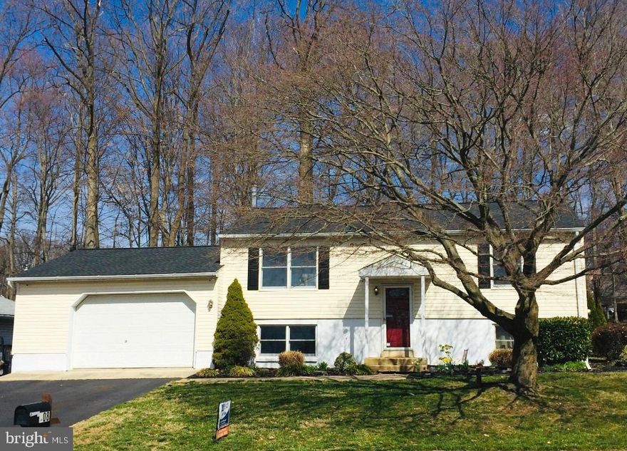 Wonderful opportunity to own in the highly desired Thomson Estates of Elkton! This property offers three bedrooms and two full bathrooms.  Move-In ready and New Roof Recently installed! You are welcomed to the property with plush green lawn and low maintenance landscaping. The large living room features hardwood flooring, great natural light, crown molding and neutral paint. The kitchen is nicely appointed with warm wood cabinetry, ceramic tile flooring, recessed lighting and stainless steel appliances. A dining area is also in the kitchen, ideal for quick meals or entertaining. This level offers two large bedrooms with wood vinyl flooring, large closets and great natural light. A nicely renovated full bathroom is shared. The master bedroom is on the lower level with an oversized en-suite bathroom. Spend cozy nights in the family room with the woodstove. Outside, the backyard is a true oasis with a large deck and patio and plenty of room for summer games relaxing and fun. This property is ideally located just of Rt. 40 at the Maryland/Delaware state line and is close to shopping, dining, I-95 and parks. Schedule your tour today!