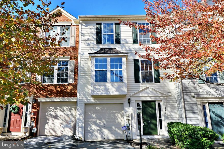 For Rent - Spacious three level fully bumped out (approx. 2700 sqft) garage unit townhome located close to MD/VA corridors and all of your shopping conveniences. Property features three bedrooms, two and half baths, a one car garage, rear paver patio, finished lower level, and a spacious deck. Loaded with upgrades like tile flooring, hardwood flooring on entire main level and hardwood steps, granite countertops, stainless steel appliances, and much more.   New carpet and a fresh coat of paint as well on exterior and interior.  No smoking in home and no pets permitted.