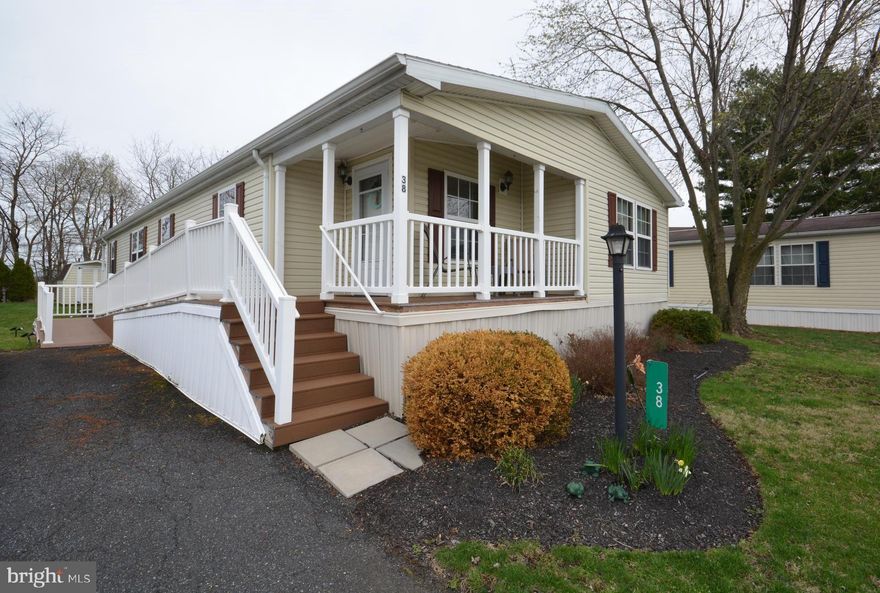 Don't miss this move-in ready modular home in the heart of beautiful Lancaster County! Offering 1,652 square feet of comfortable living space, this home features 2 spacious bedrooms and 2 full baths—both equipped with walk-in showers. The primary suite also includes a walk-in closet and a relaxing garden tub. You'll love the open floor plan, highlighted by a large eat-in kitchen with island and bar, a generous living room, cozy den, separate dining area with slider to the deck, and a convenient laundry room with exterior access. Located in the highly sought-after 55+ Triple J Community, this home is ready for you to enjoy!  Shed, Refrigerator, and W/D included.