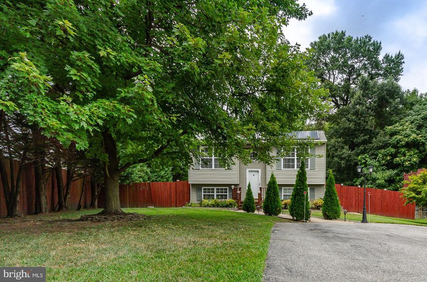 Wonderful home located on a dead-end street that has a lot of privacy with a fenced back yard that backs to trees. This home has so many updates such as a completely remodeled kitchen with Pergo floors,  plenty of cabinets, stainless steel appliances, breakfast bar with recessed and track lighting and the living/dining room has lots of light for plants.  On this level, you have the Master bedroom with an updated master bath and the second bedroom with another updated full bath.  On the lower level, you have the third bedroom and full bath.  There is also, a nice family room with pellet stove for warm winter nights and an exercise area for equipment or office cove.  This home has a lot of light both on the upper and lower level.  There is a walkout to the backyard as well as a laundry and storage room. The updated deck off the kitchen is large with stairs to back yard and fire pit. This home is a SMART HOME and has security cameras and also has solar panels.  The roof is 5 years old and the HVAC is approx 6 years old.  Don't Miss Out!