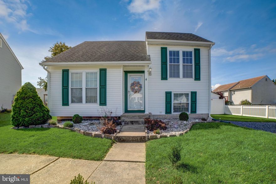 This detached split-level home is in excellent condition with plenty of updates! The living area is spacious and features high cathedral ceilings. The kitchen is custom-made with bright white cabinets, ceramic backsplash, and Corian countertops. A sliding door from the dining room leads out to a large deck. The light fixtures have been updated, and the interior doors have been replaced. The water heater and sump pump are newer, and the bathrooms have been updated with a beautiful tile shower and glass door, and a large linen closet for storage. The lower level features a spacious bedroom currently used as a family room but can easily be converted into two additional bedrooms. There is a large laundry area on the lower level, a fenced yard, a large shed, and a patio below the deck. The best part? There is no mandatory HOA!
