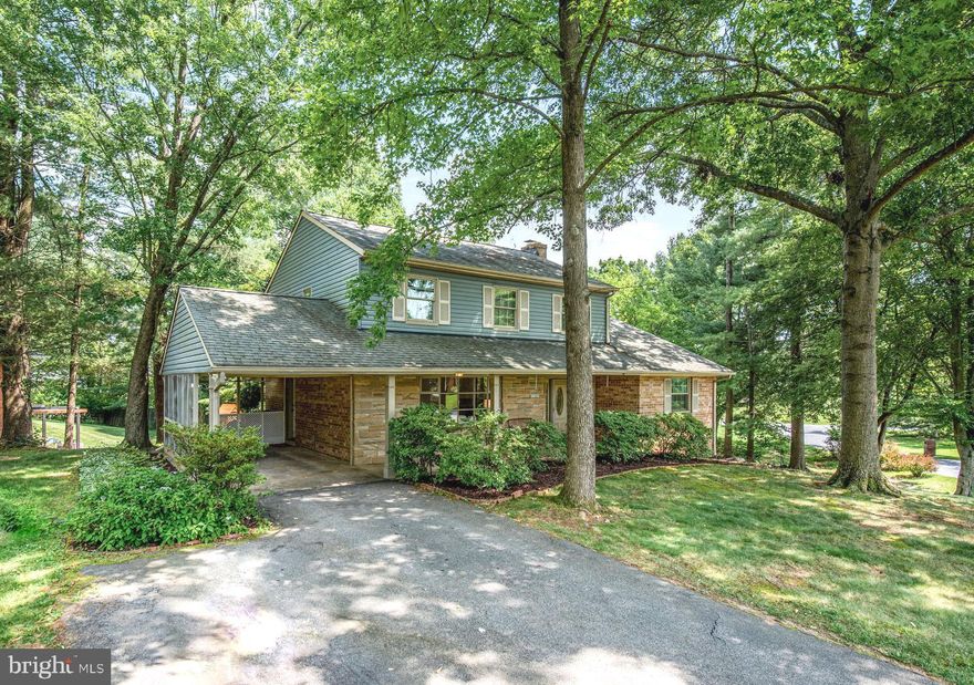 The time is right to buy this amazing home priced to sell. Best value in Olney! Lots of upgrades including Pella windows throughout and brand new 200 amp heavy up. Enjoy the holidays in this custom colonial  in the highly desirable Williamsburg Village neighborhood in Olney. Nestled on a generous .40-acre lot, this light-filled 4-bedroom, 3.5-bath home offers over 2,400 square feet of beautifully finished living space. Recent  upgrades including a brand new 200amp heavy up. As you approach, the wide, welcoming  front porch invites you into the main level with  a spacious entry hall  adorned with custom tile floor with decorative inset and two closets. The expansive living room has a grand bow/picture window and crown molding. The spacious family room with a cozy  fireplace, ceiling fan, and custom-lighted built-in bookcases provide a perfect sanctuary for family time and relaxation. Enjoy gathering in the elegant formal dining room  enhanced with crown molding, chair rail, custom trim, and  double window.   The heart of the home—a remodeled eat-in kitchen—shines with granite countertops, recessed lighting, decorative ceiling beams, wainscoting and chair rail, and a central island with stools illuminated by pendant lights, ideal for food preparation and casual dining. The upper level offers three spacious bedrooms, each with ceiling fans and  hardwood floors. The spacious primary suite has two large custom closets and a private bath with a linen closet.  Pull down stairs provide easy access to ample attic storage. The sunny, walk-out lower level expands your living options with a large bedroom suite, a renovated bath, and a potential space for future rooms. The home has wonderful  curb appeal with its custom stone and shingle façade and a wide front porch. Architectural shingle roof. Location, location, location- enjoy living just minutes from Olney's vibrant shops, restaurants, and recreational options. Close to the ICC and major routes make commuting a dream. Olney Elementary, Rosa Parks Middle School, Sherwood High School.  Don't miss this exceptional property in Olney!